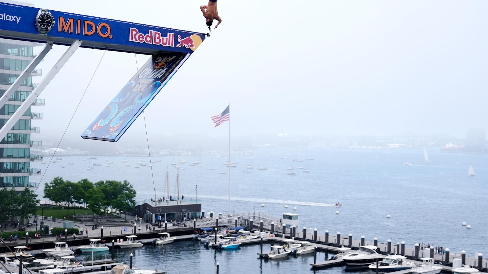 Cliff Divers Prepare to Dive 90 Feet at Boston Art Museum for Major Sporting Event