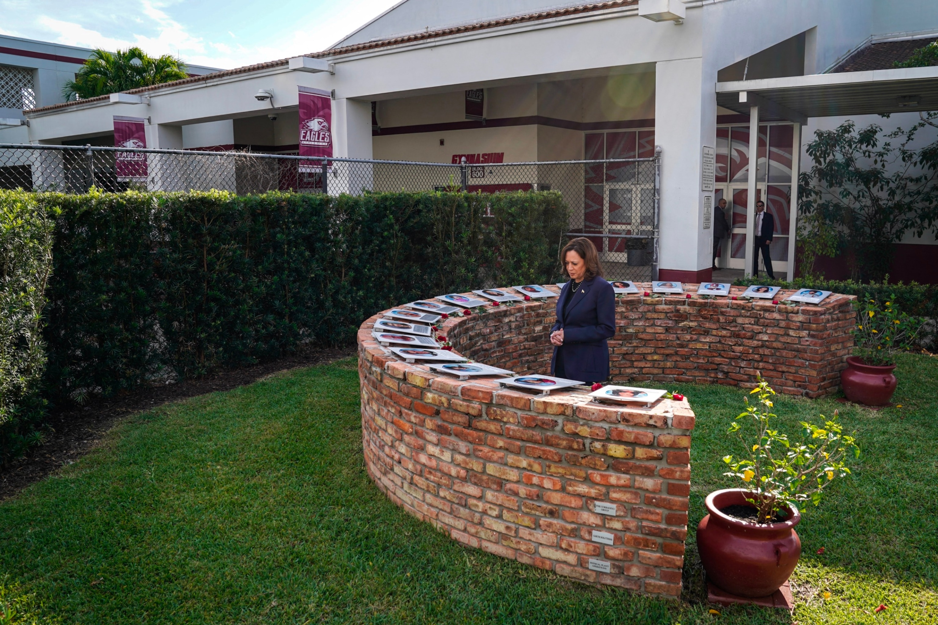 PHOTO: Vice President Kamala Harris participates in a moment of silence at the Marjory Stoneman Douglas High School memorial in Parkland, Fla., March 23, 2024. 