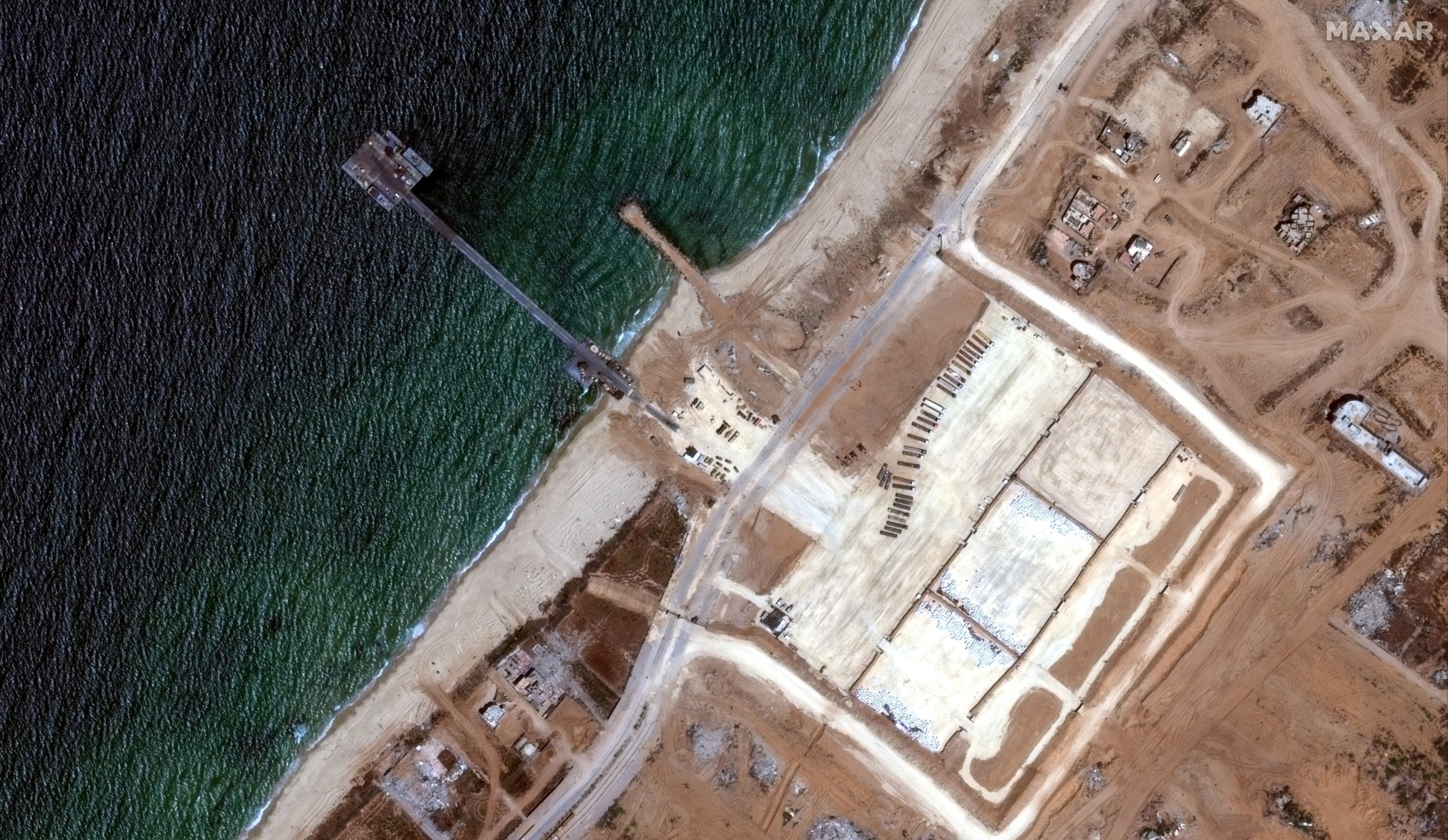 PHOTO: A satellite image shows U.S. military-run humanitarian aid pier in Gaza, June 12, 2024. 