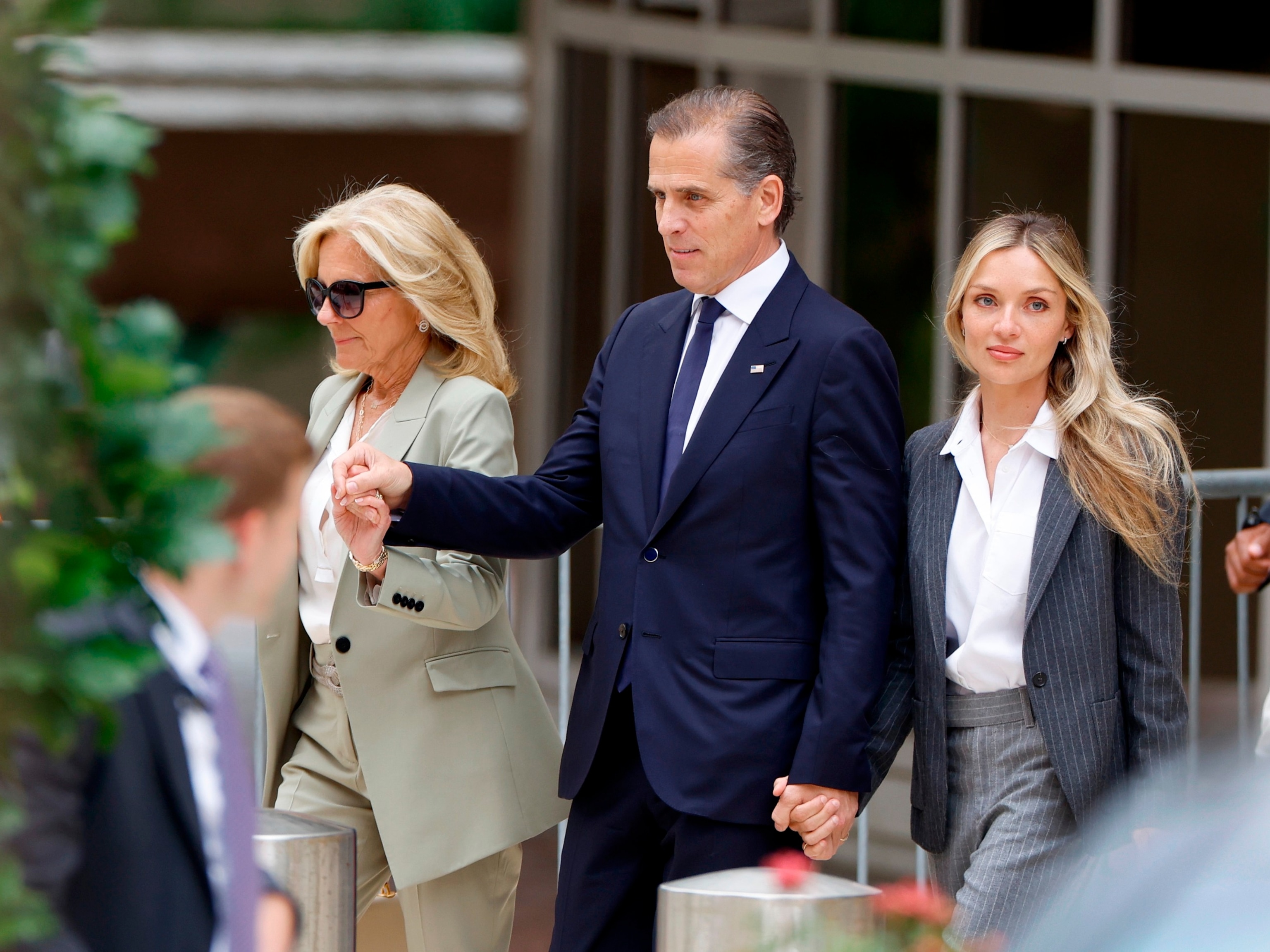 PHOTO: First lady Jill Biden, Hunter Biden, son of President Joe Biden, joined by his wife Melissa Cohen Biden, leave the J. Caleb Boggs Federal Building on June 11, 2024 in Wilmington, Del.