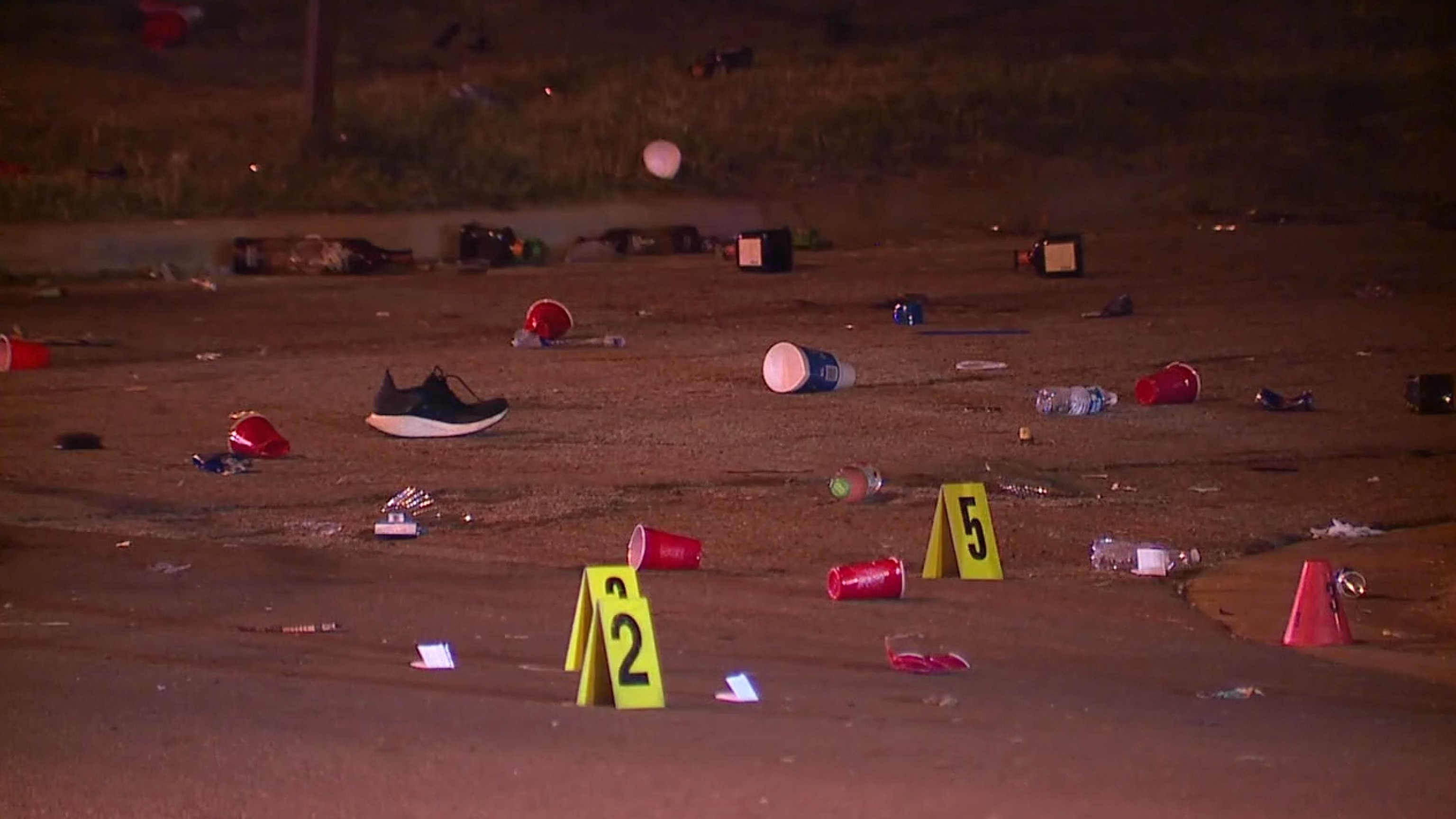 PHOTO: Police investigate a mass shooting that erupted on June 2, 2024, that left one man dead and 28 people injured at a large street party in Akron, Ohio.