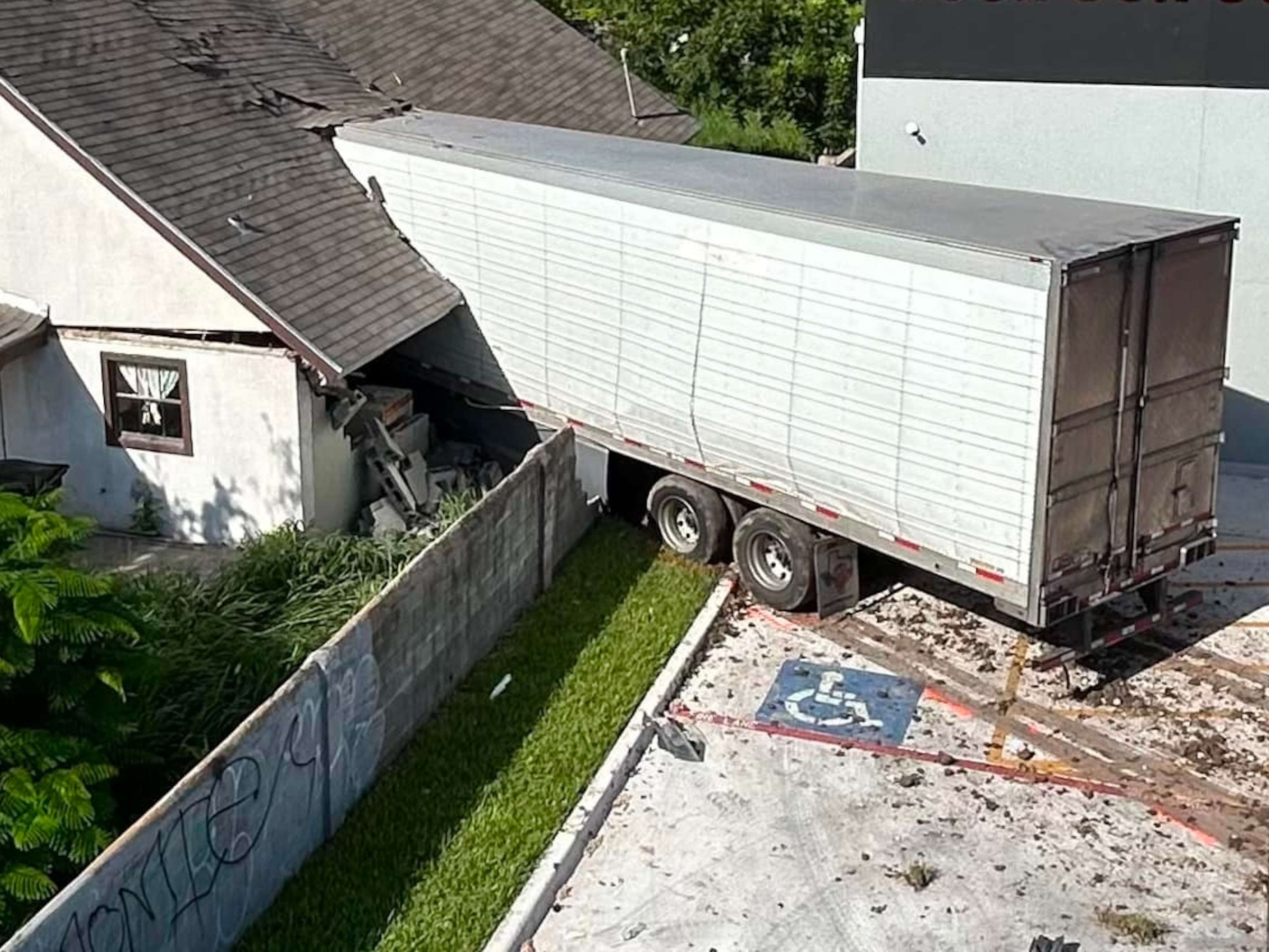 PHOTO: An 18-wheeler veered off an expressway and crashed into a home, in Mission, TX, on June 29, 2024.