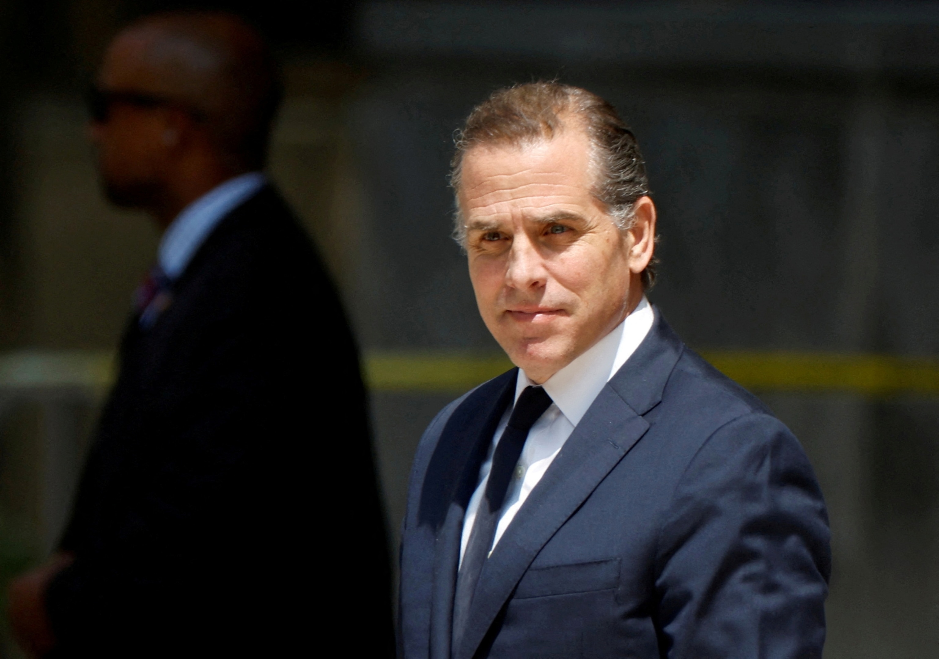 PHOTO: Hunter Biden departs federal court after a plea hearing on two misdemeanor charges of willfully failing to pay income taxes in Wilmington, Del., July 26, 2023.