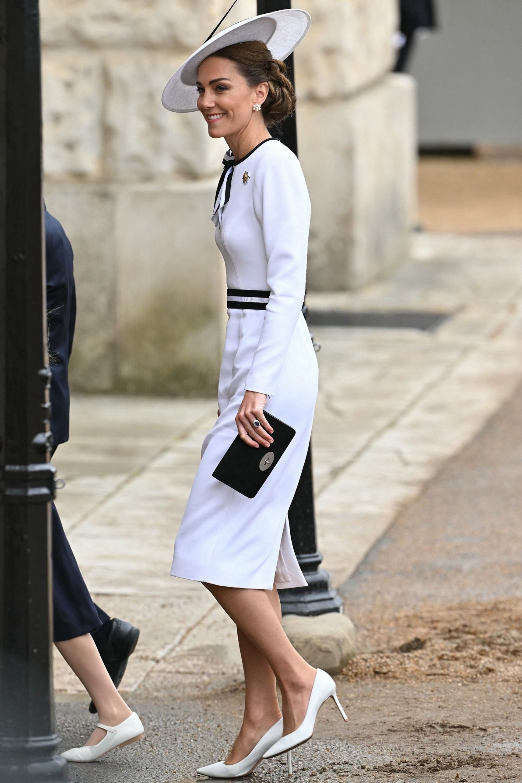 Kate Middleton makes first public appearance since cancer diagnosis in white attire