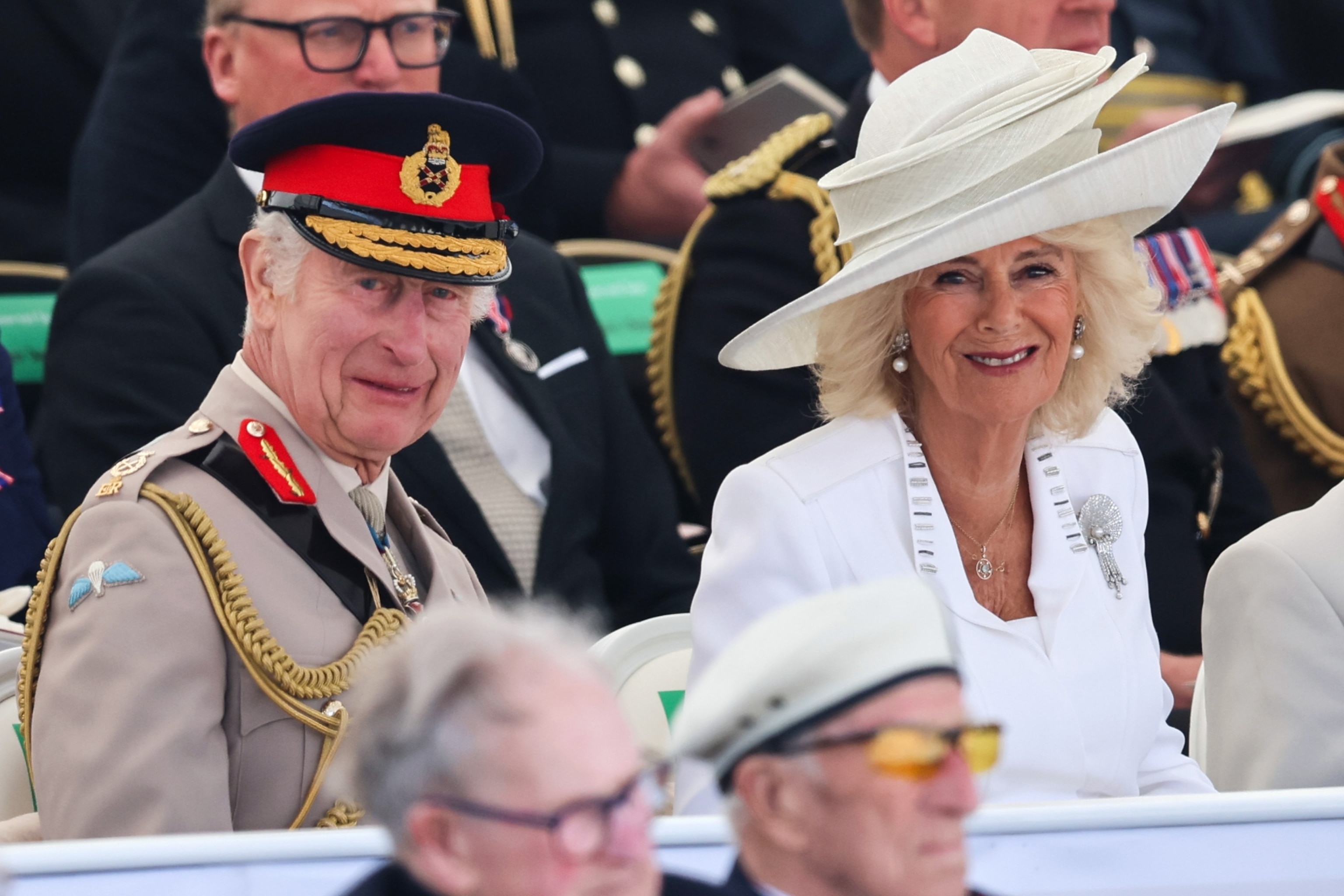 PHOTO: King Charles III and Queen Camilla attend the UK Ministry of Defense and the Royal British Legions commemorative event at the British Normandy Memorial to mark the 80th anniversary of D-Day on June 06, 2024, in Ver-Sur-Mer, France. 