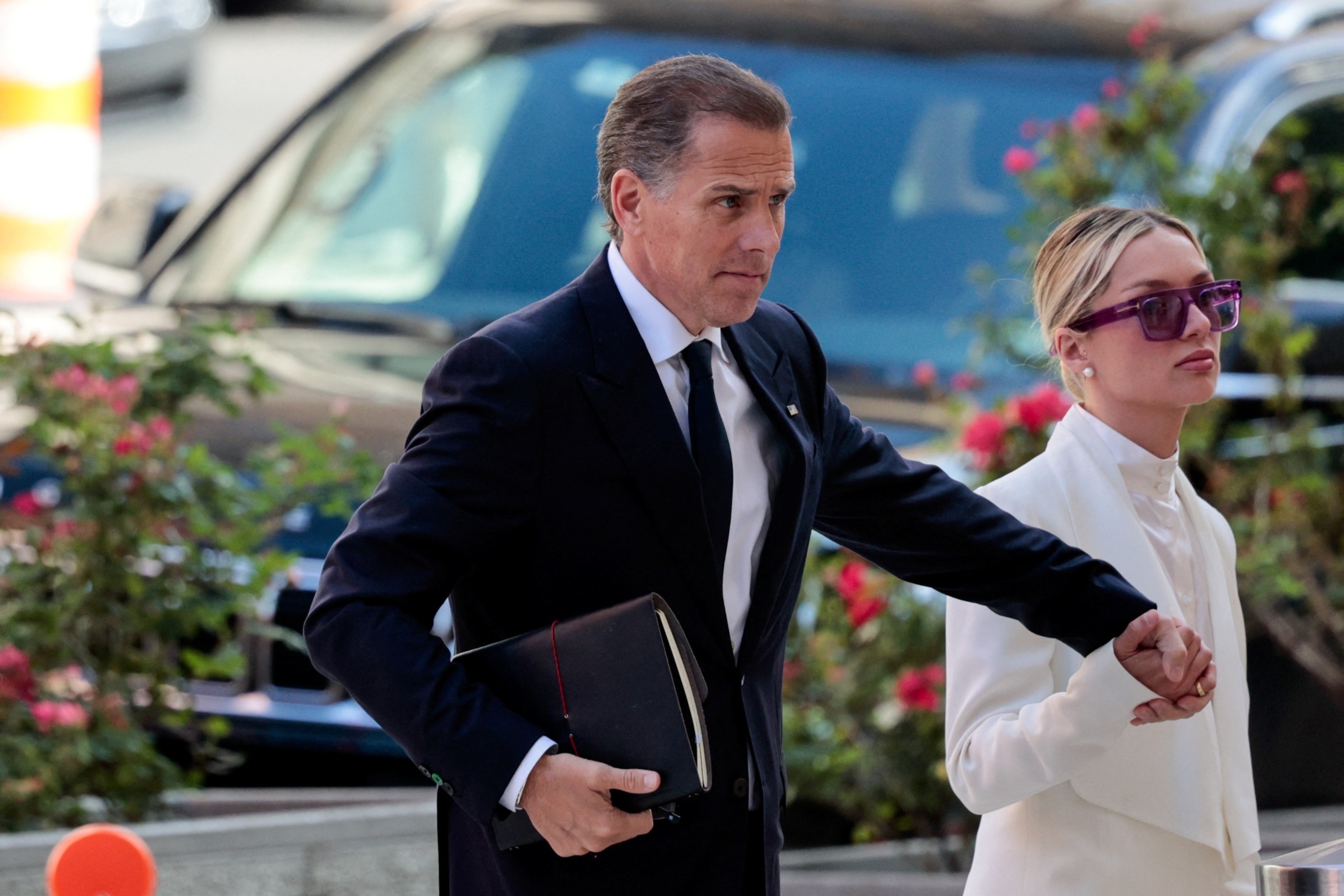 PHOTO: Hunter Biden, son of President Joe Biden, and his wife Melissa Cohen Biden, arrive at the federal court for his trial on criminal gun charges in Wilmington, Del., June 7, 2024. 