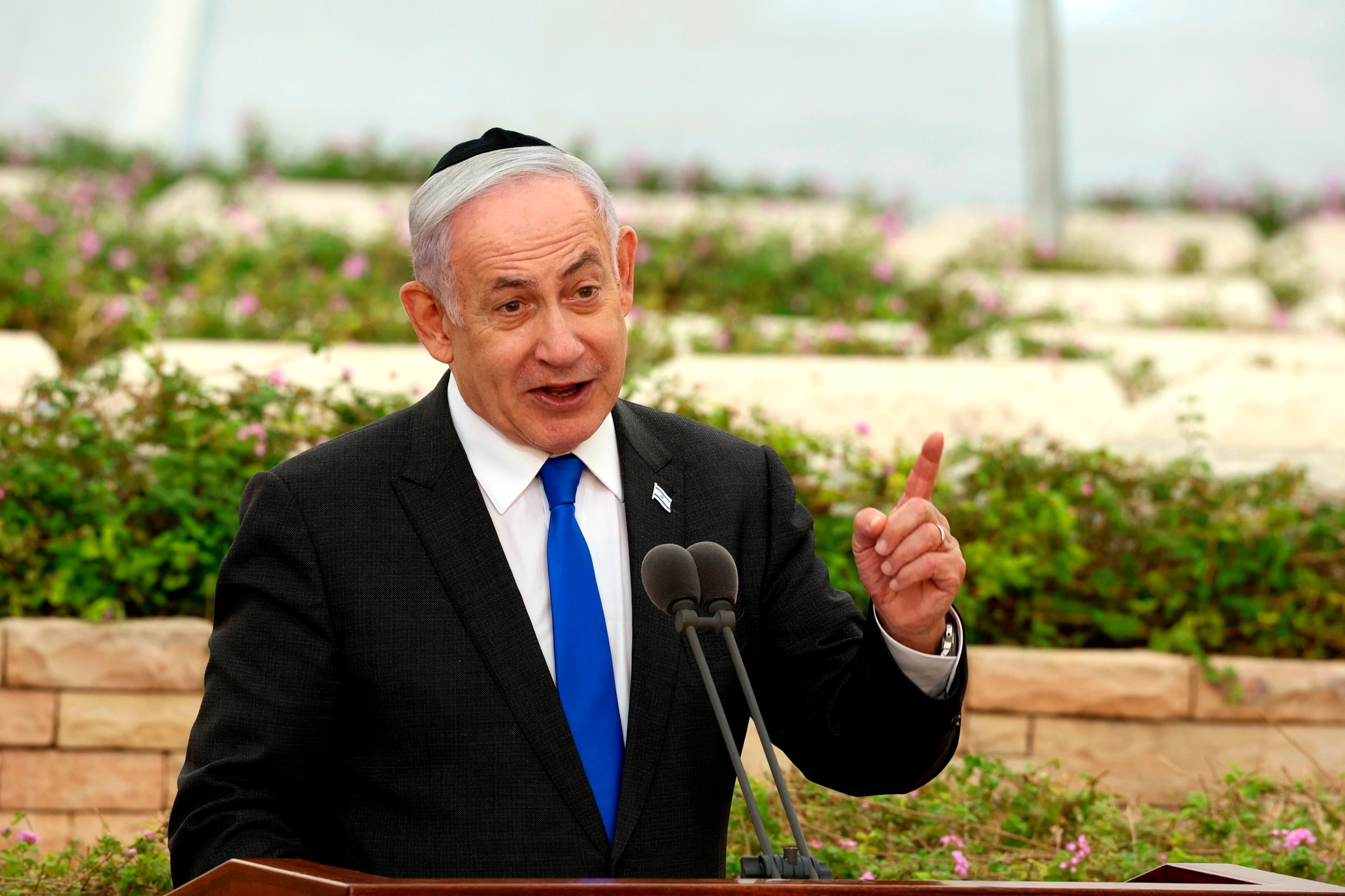 PHOTO: Israeli Prime Minister Benjamin Netanyahu speaks during a ceremony at the Nahalat Yitshak Cemetery in Tel Aviv, Israel, on June 18, 2024. 