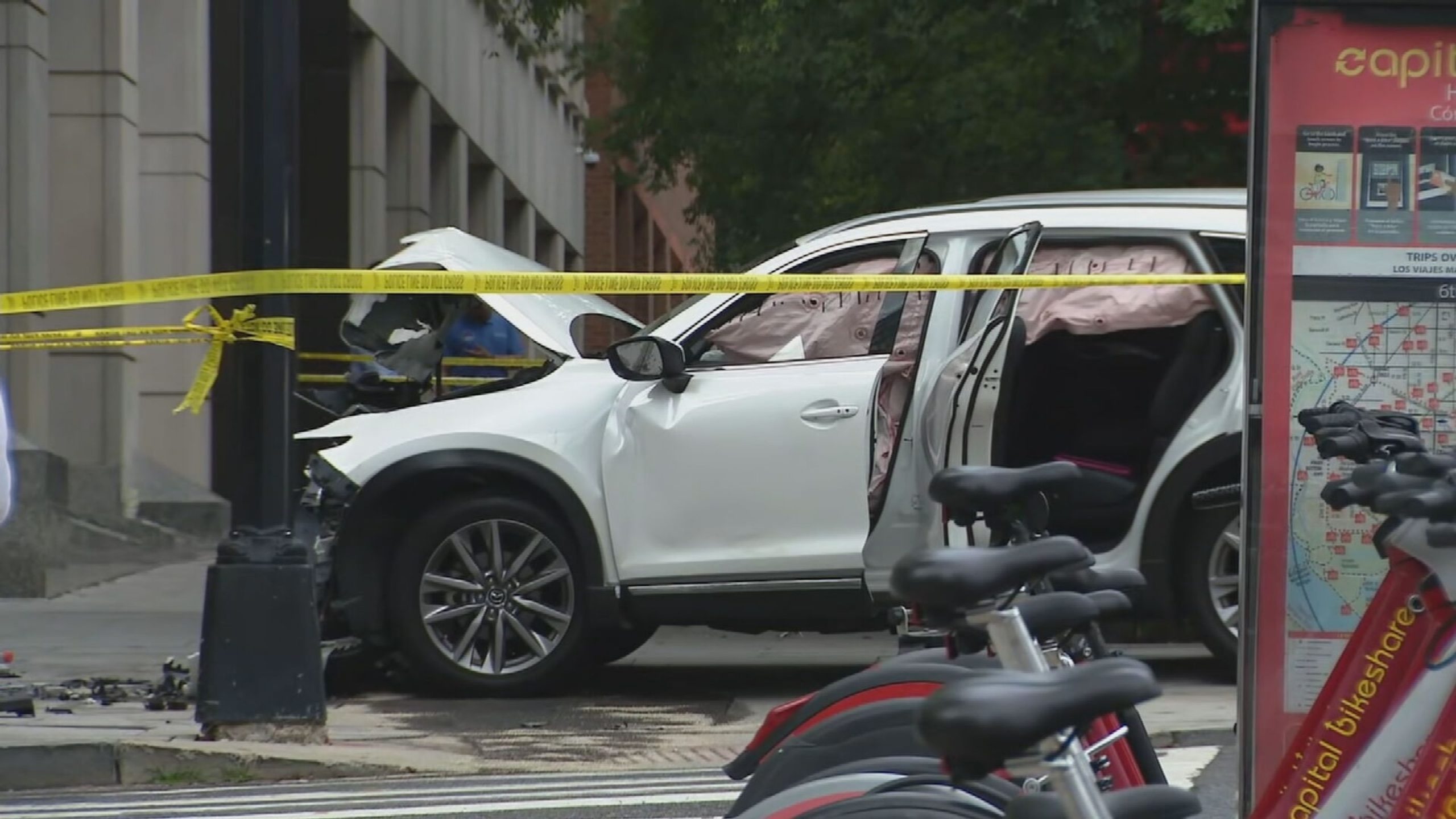 Police Report: Elderly Woman Fatally Injured in Vehicle Theft and Building Crash near DC US Attorney's Office