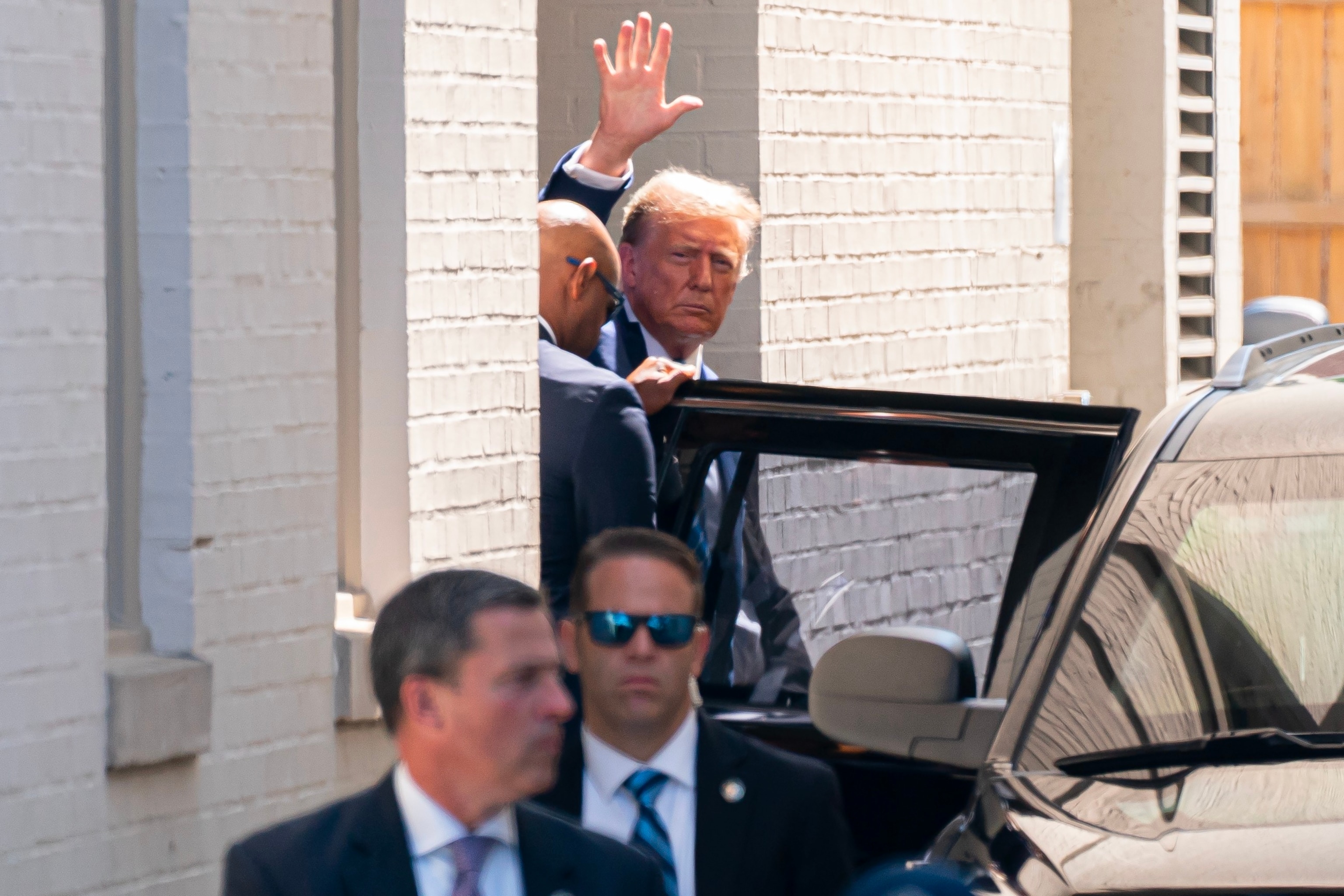 PHOTO: Former U.S. President Donald Trump departs after delivering remarks at a House Republicans Conference meeting at the Capitol Hill Club, June 13, 2024, in Washington.