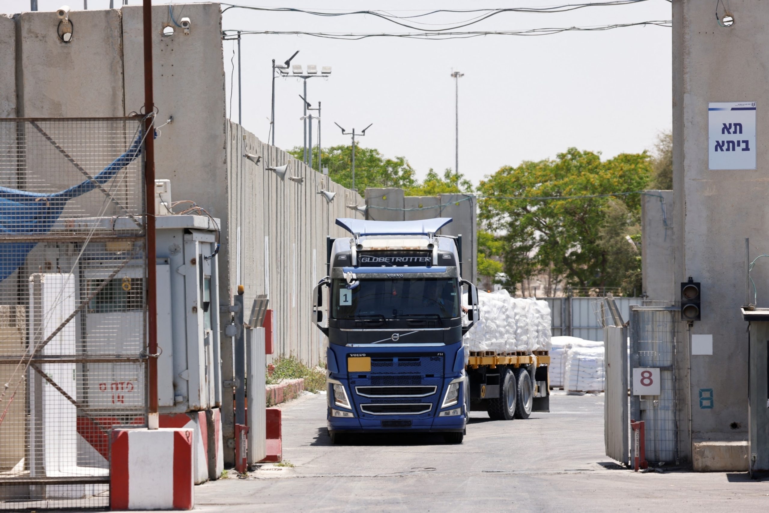 Right-wing Israeli settlers raise concerns about aid delivery to Gaza, while peace activists push for passage of aid trucks