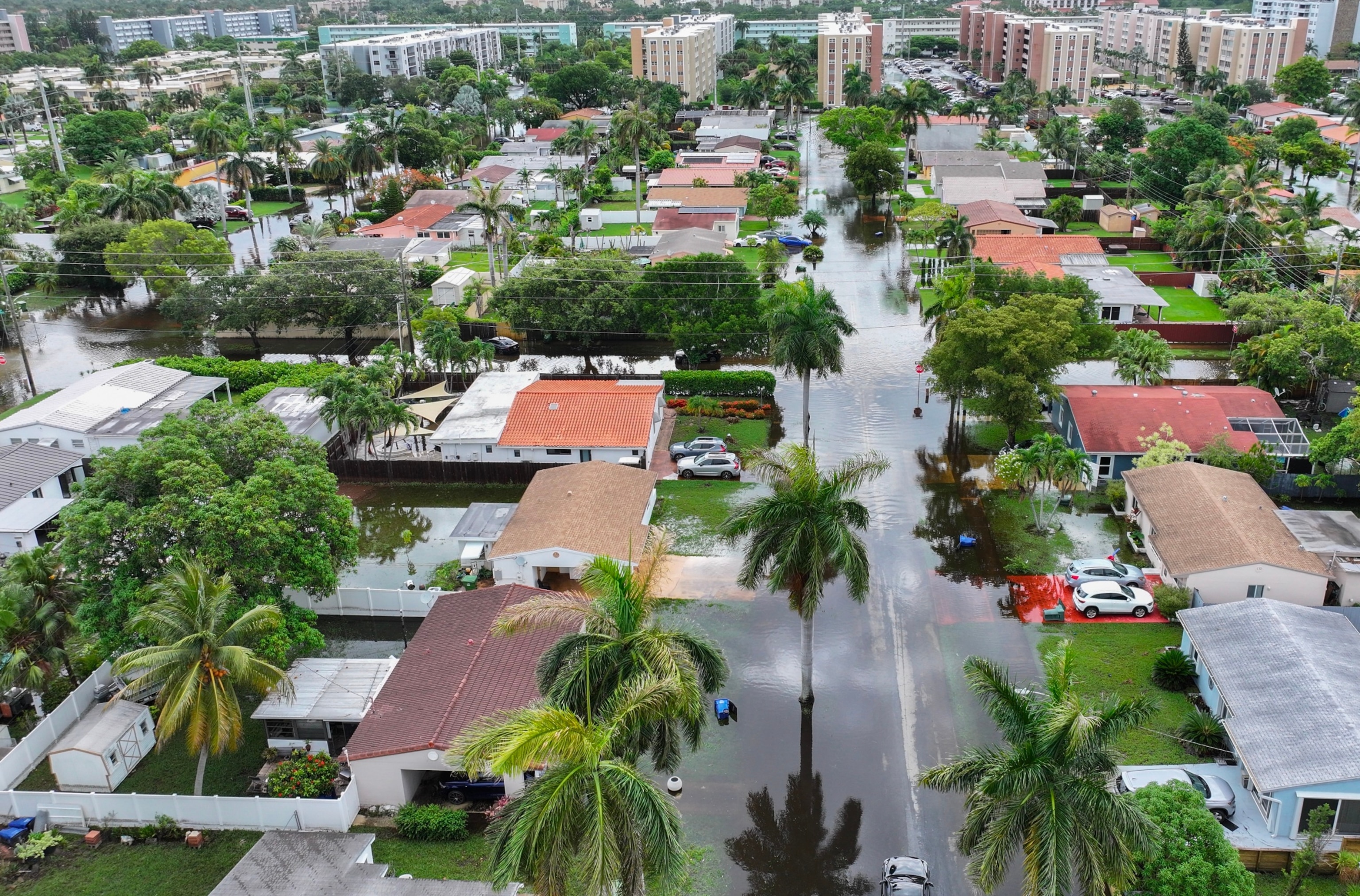 PHOTO: In an aerial view,  flood waters inundate a neighborhood on June 13, 2024, in Hallandale Beach, Florida. As tropical moisture passes through the area, areas have become flooded due to the heavy rain. 