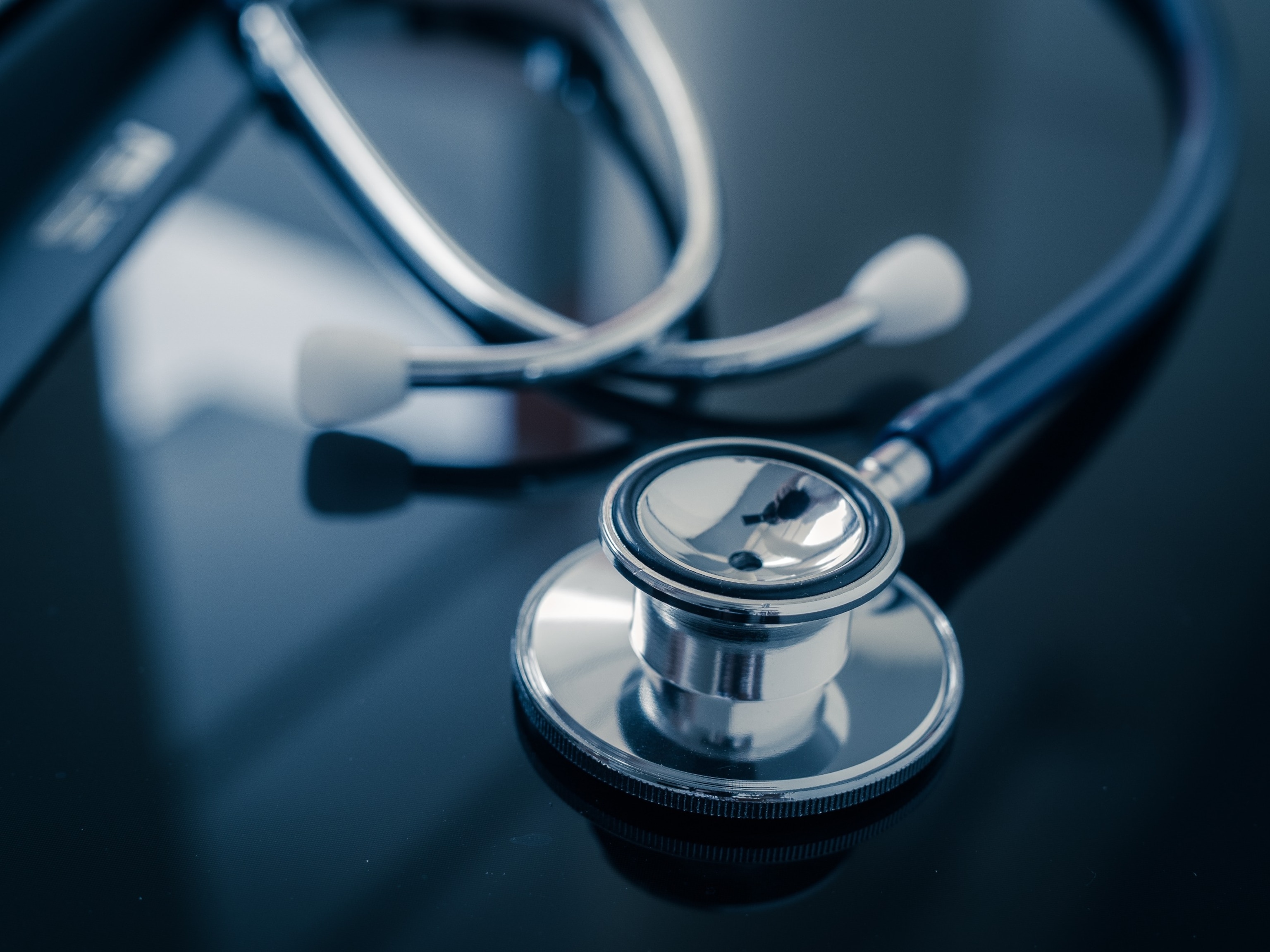 PHOTO: Stethoscope at an examination table in a hospital.