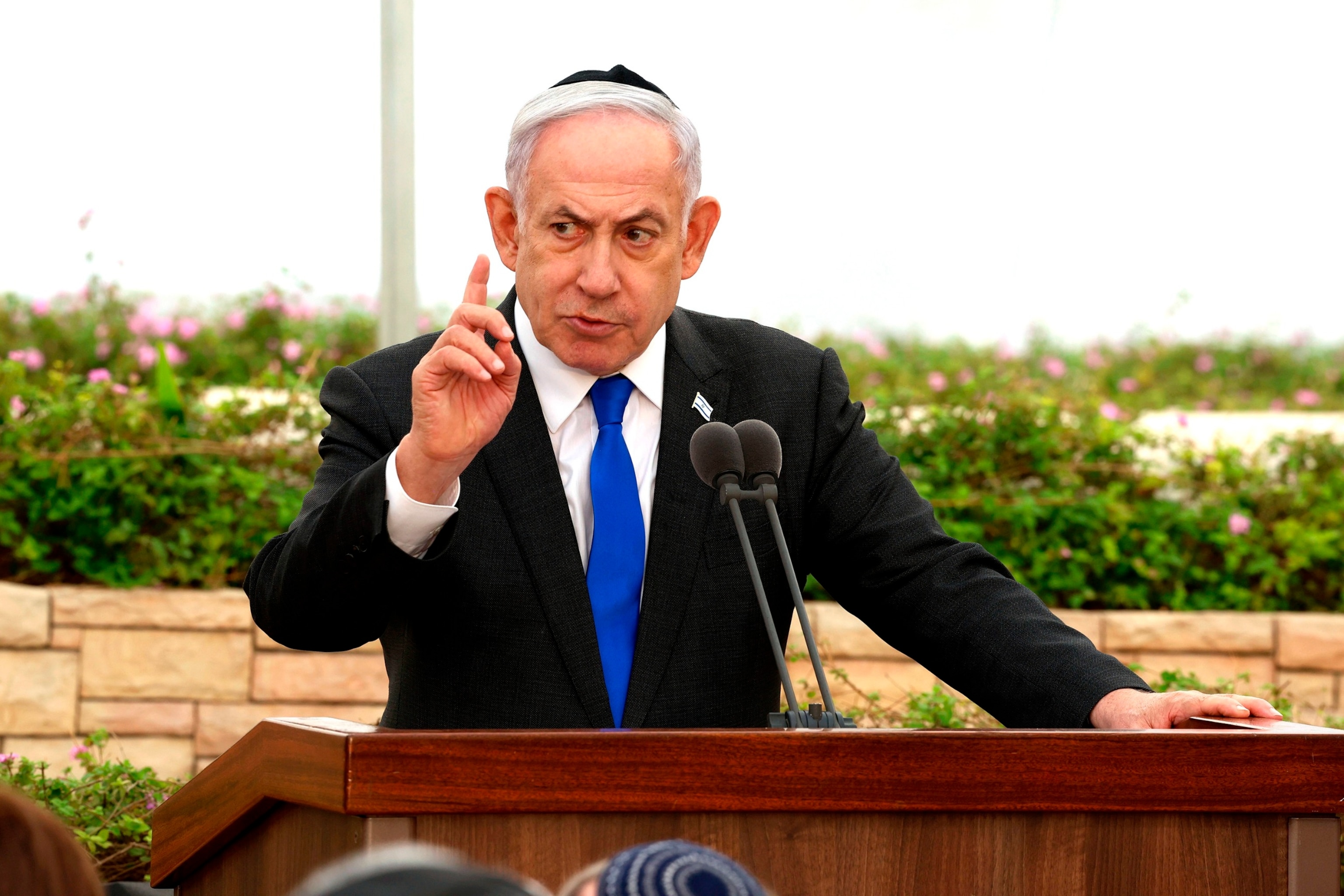 PHOTO: Israeli Prime Minister Benjamin Netanyahu speaks during a ceremony at the Nahalat Yitshak Cemetery in Tel Aviv, Israel, on June 18, 2024. 