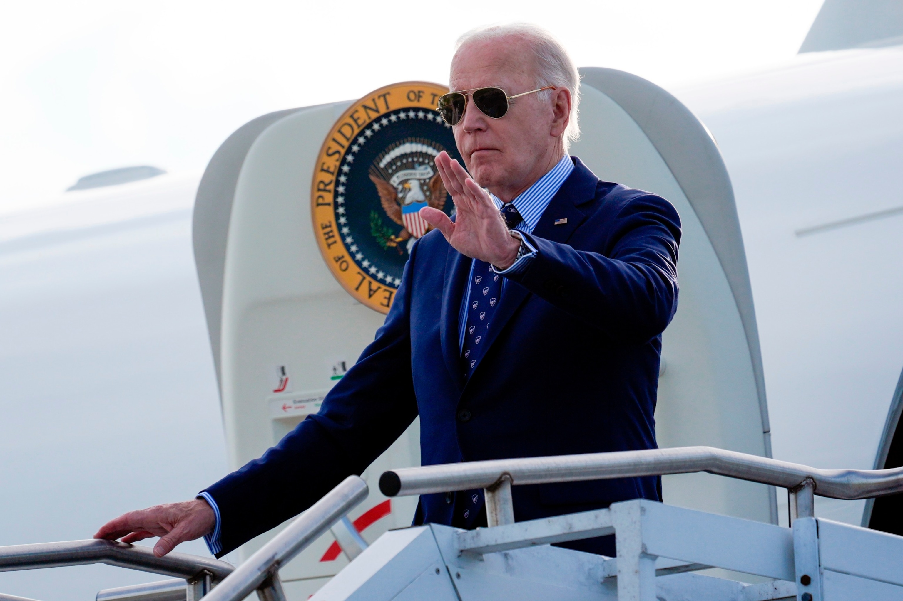 PHOTO: President Joe Biden waves as he arrives on Air Force One at Westchester County Airport in White Plains, N.Y., June 3, 2024.