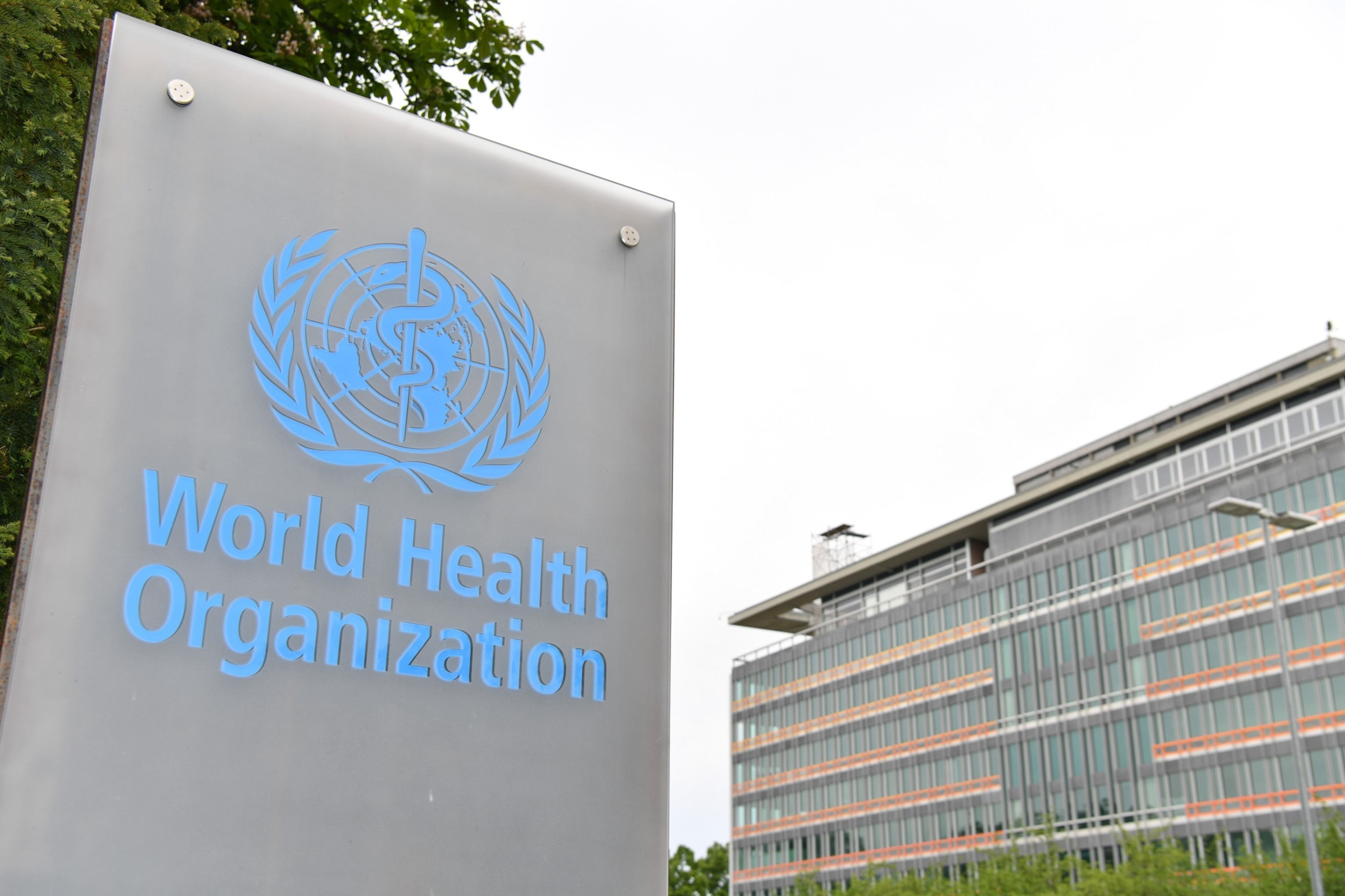 PHOTO: This photo shows a logo of the World Health Organization with the WHO headquarters in the background in Geneva, Switzerland, May 21, 2023.
