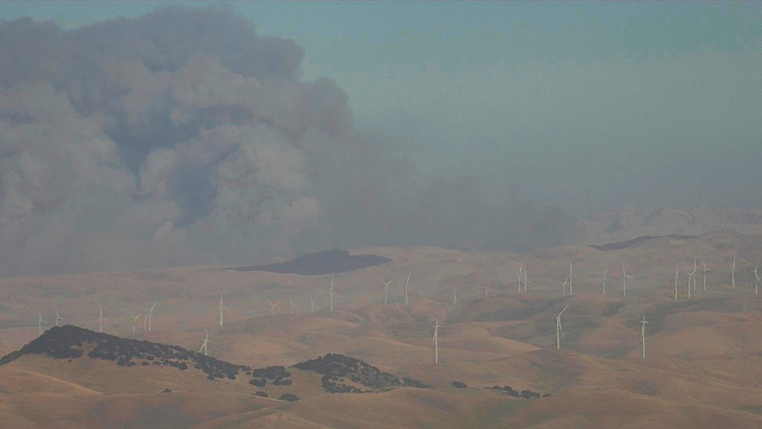 Wildfire near San Francisco grows to 11,000 acres, injuring 2 firefighters