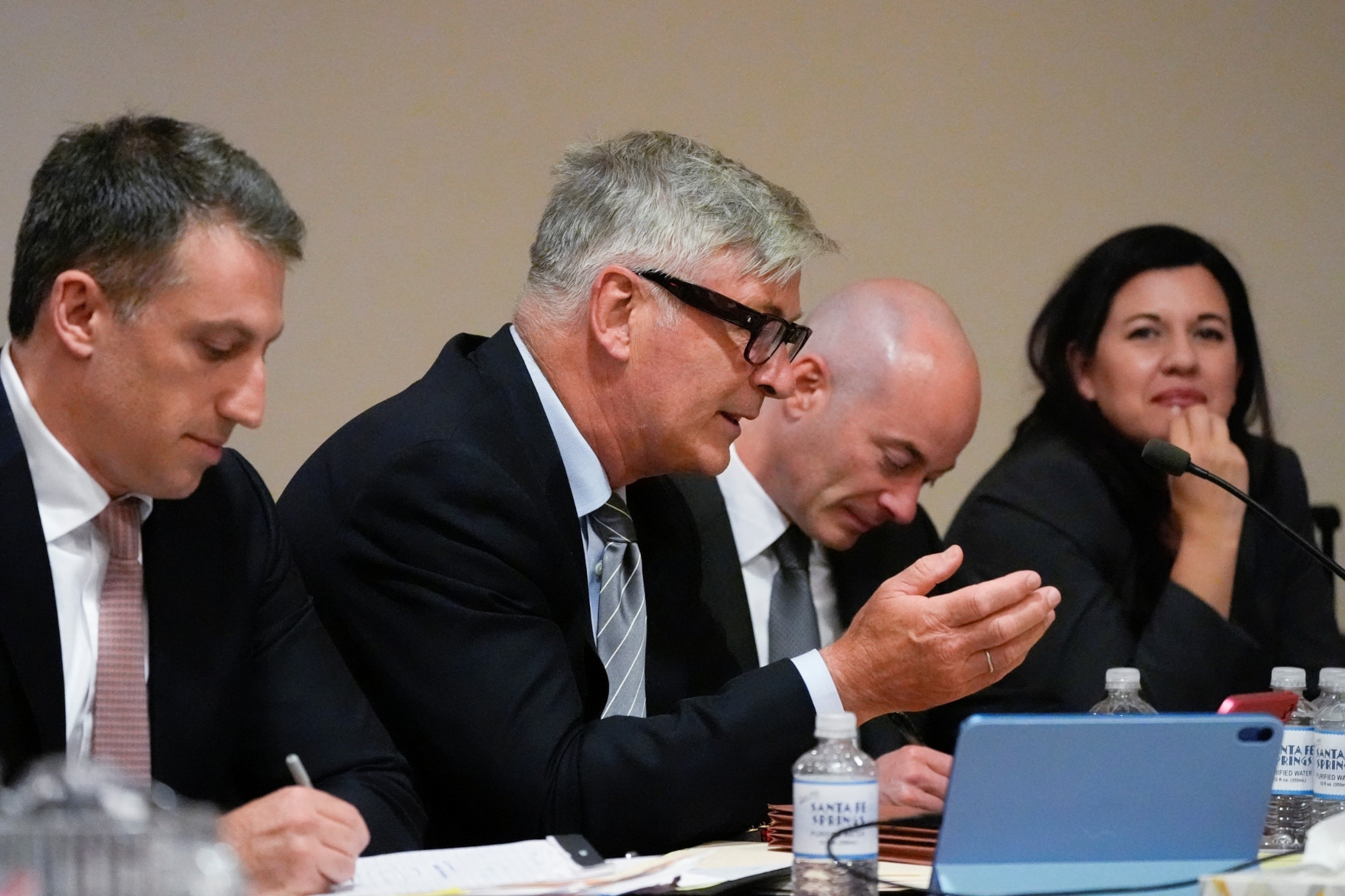 PHOTO: From left to right, lawyer Alex Spiro, Alec Baldwin, lawyer Luke Nikas and lawyer Heather LeBlanc participate in a pretrial hearing in Santa Fe, N.M., July 8, 2024. 