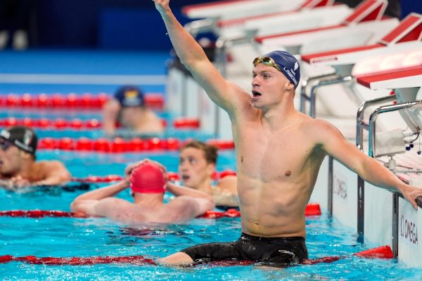 Bob Bowman, longtime coach of Michael Phelps, emotional as new swimmer Leon Marchand wins gold