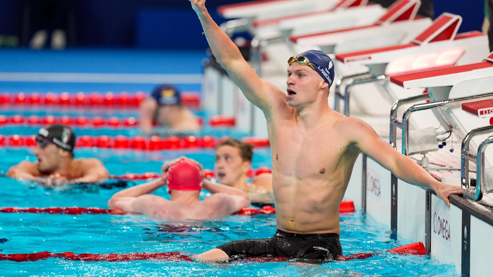 Bob Bowman, longtime coach of Michael Phelps, emotional as new swimmer Leon Marchand wins gold