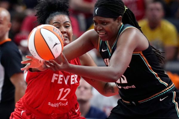 Caitlin Clark leads Fever to victory over Liberty with historic triple-double as WNBA rookie