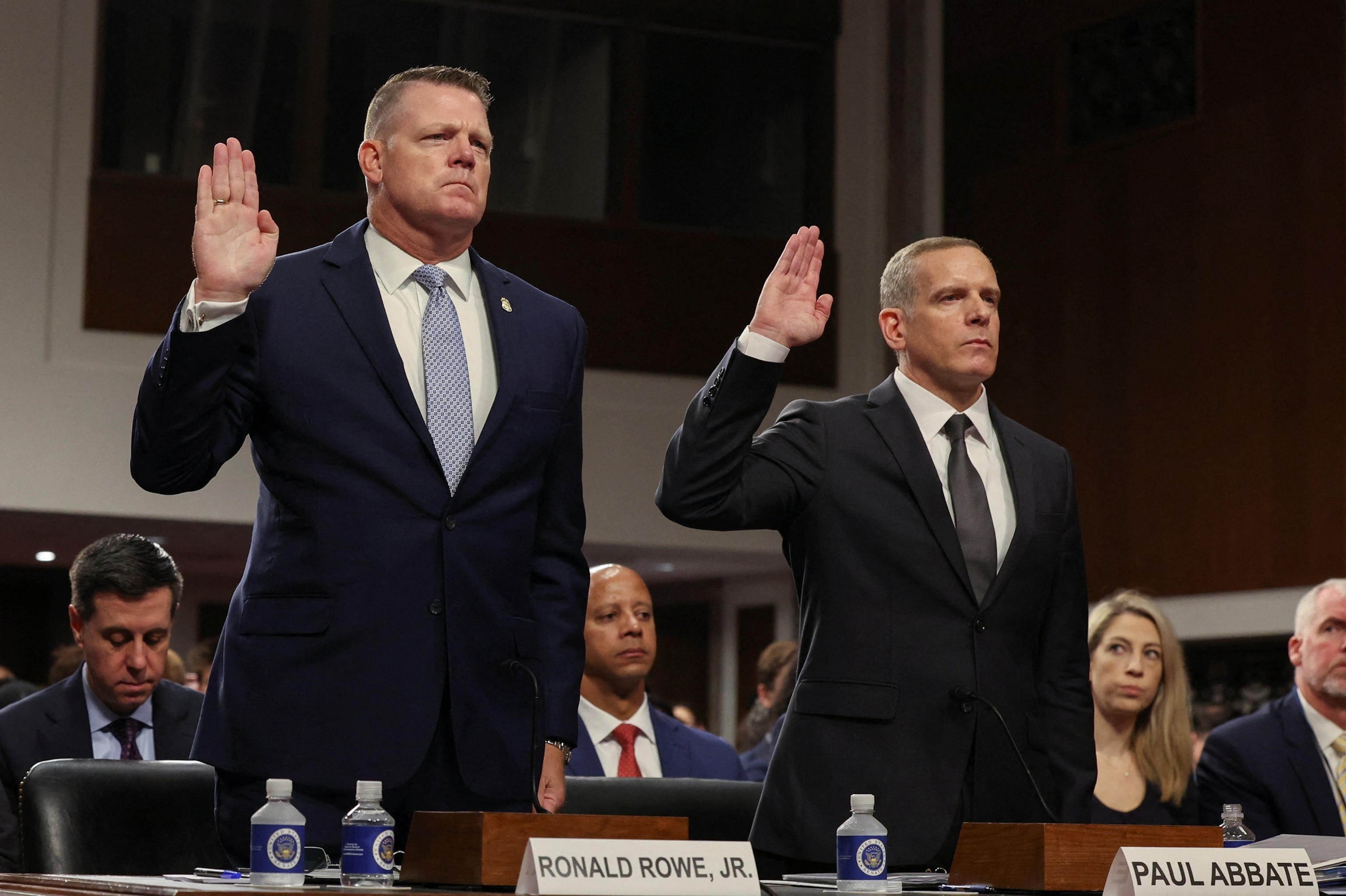 PHOTO: Acting Director of the U.S. Secret Service, Ronald L. Rowe, Jr. and Deputy Director of the FBI Paul Abbate are sworn-in before a Senate Judiciary Committee, July 30, 2024, in Washington.