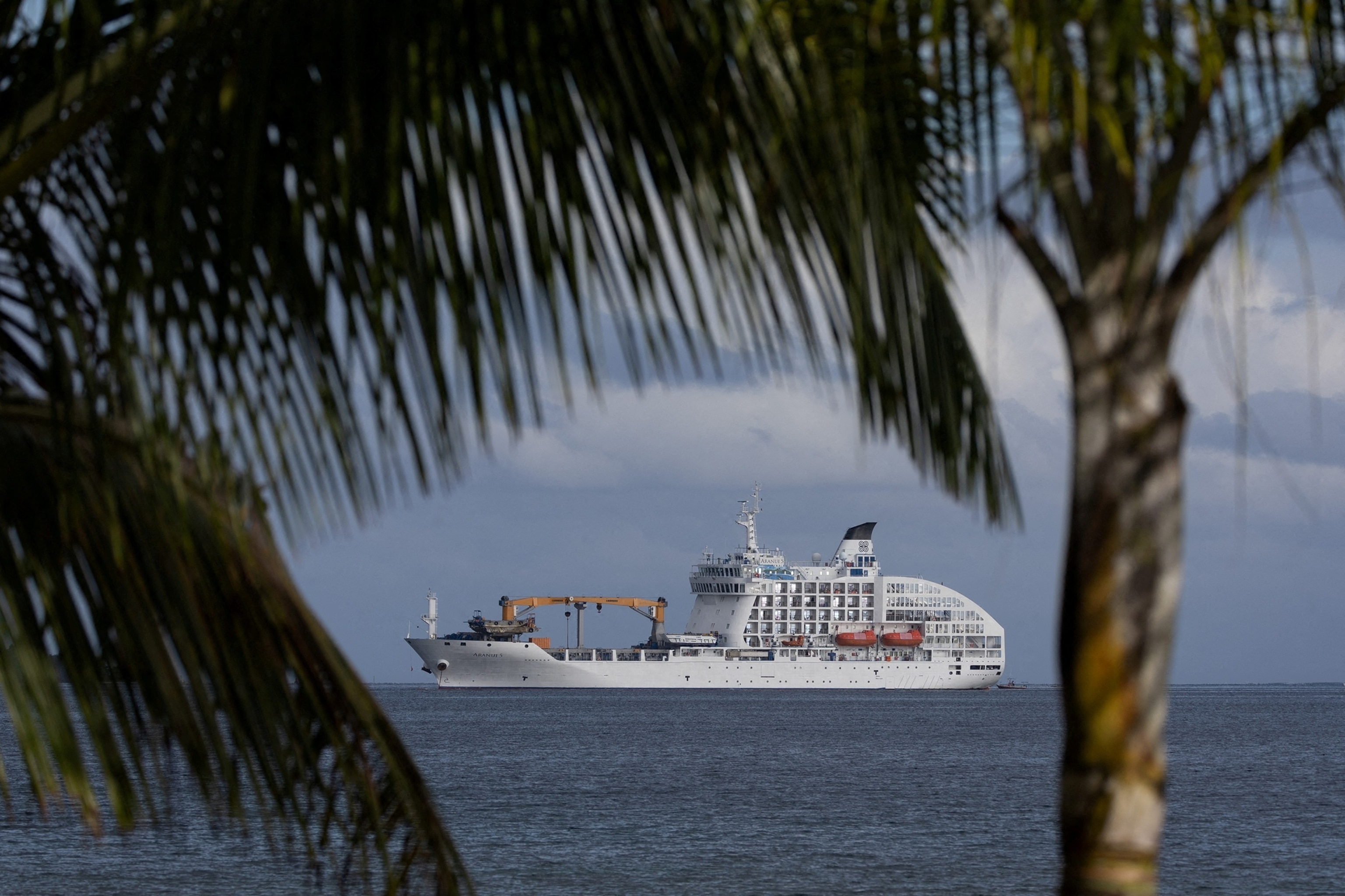 PHOTO: The Aranui 5, a cruise ship-cum-freighter where some of the athletes competing at the Paris 2024 Olympics surfing competition will stay, is seen near Teahupo'o, Tahiti