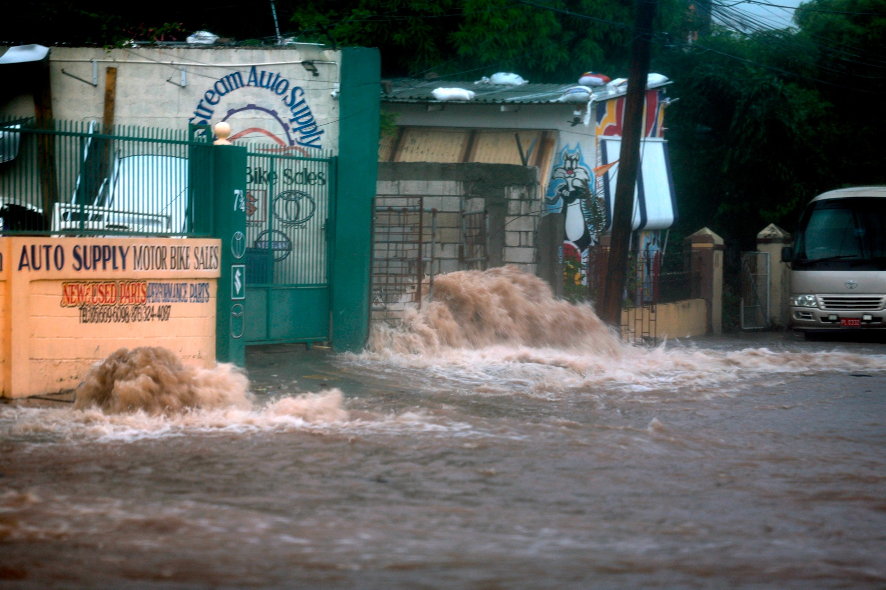 PHOTO: Floodwaters pour onto the street as Hurricane Beryl passes through the area on July 3, 2024, in Kingston, Jamaica. Beryl has caused widespread damage in several island nations as it continues to cross the Caribbean.