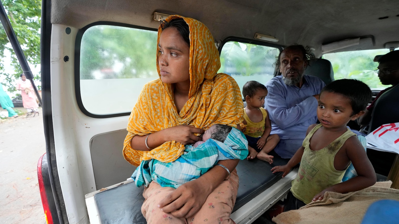 Indian Mother Gives Birth on Boat Due to Flooding on River Island