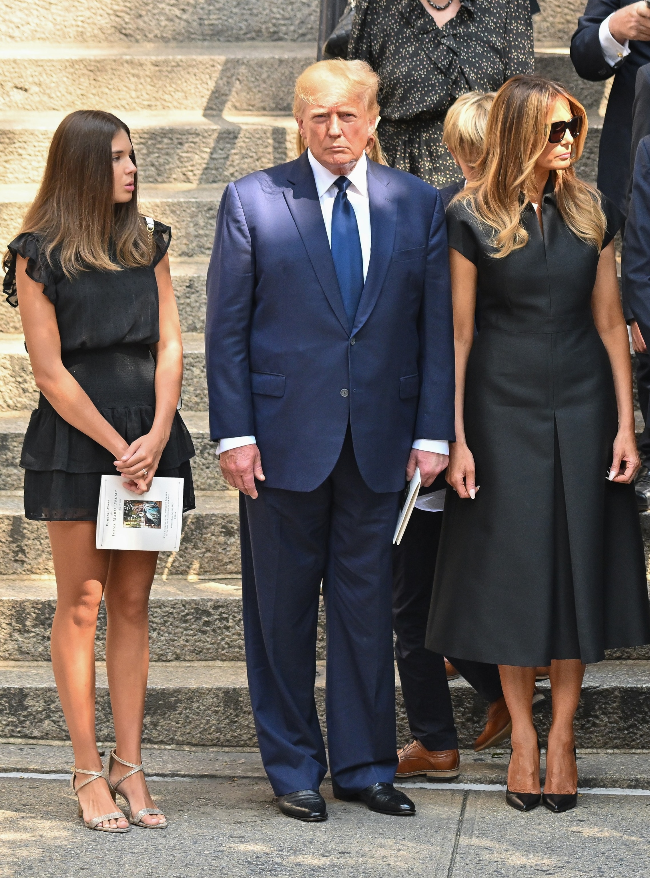 PHOTO: Kai Madison Trump, former  President Donald Trump and former first lady Melania Trump are seen at the funeral of Ivana Trump on July 20, 2022 in New York City. 