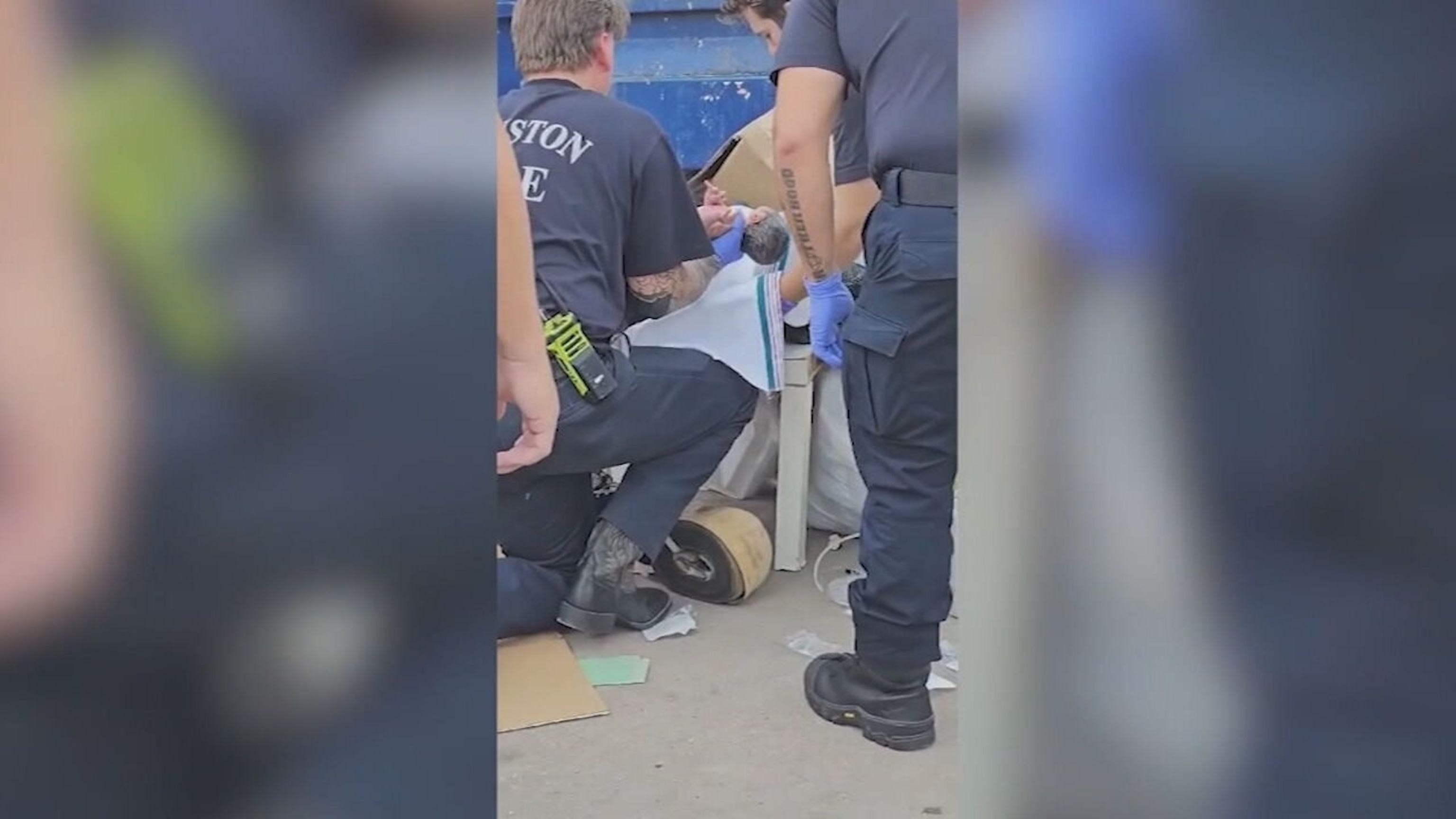 PHOTO: First responders rescue a newborn who was found alive in a dumpster at an apartment complex in Houston, July 21, 2024.