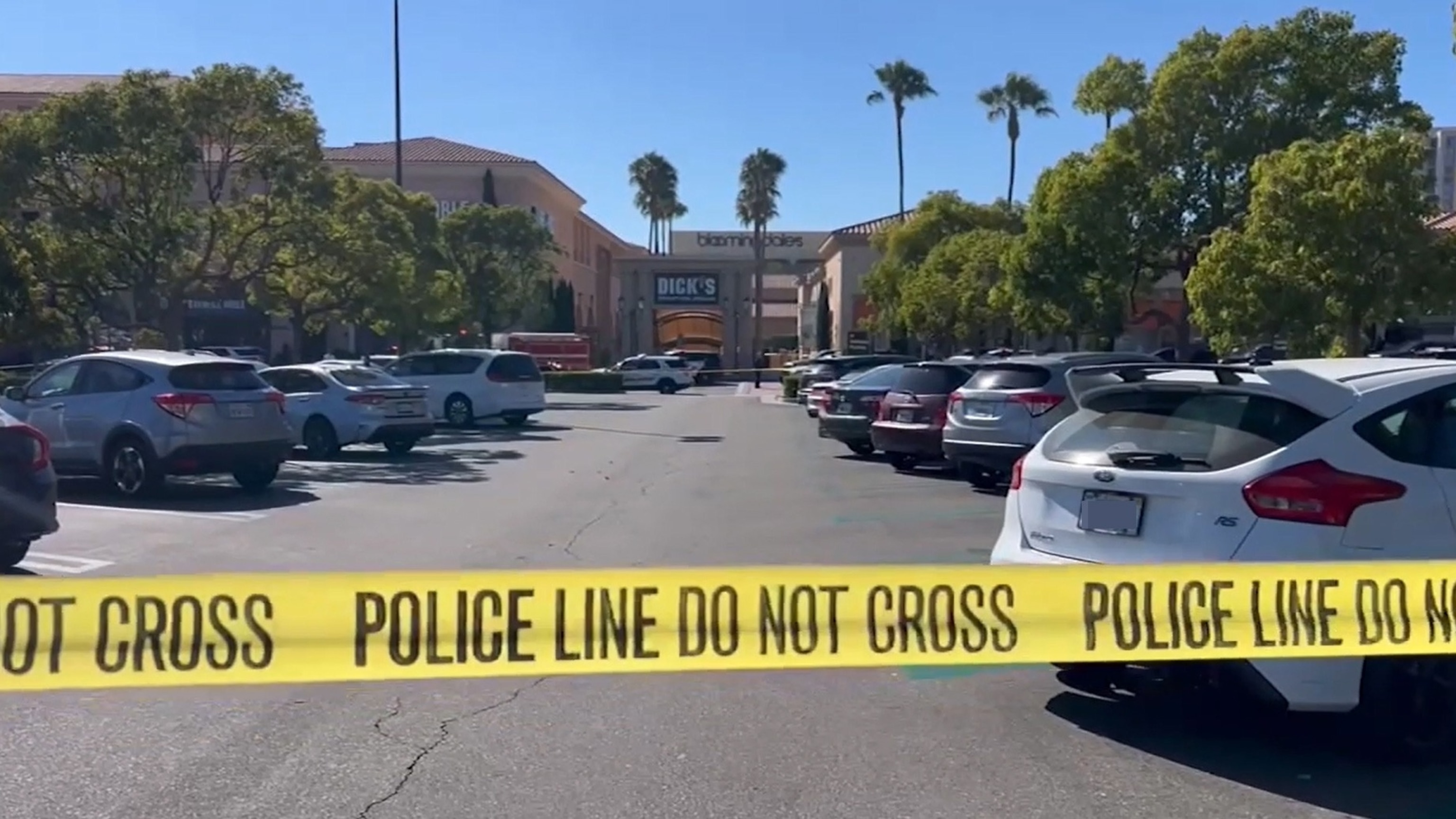 PHOTO: Police respond to the scene after a woman was fatally struck by a fleeing vehicle following a robbery at Fashion Island in Newport Beach, California, July 2, 2024.