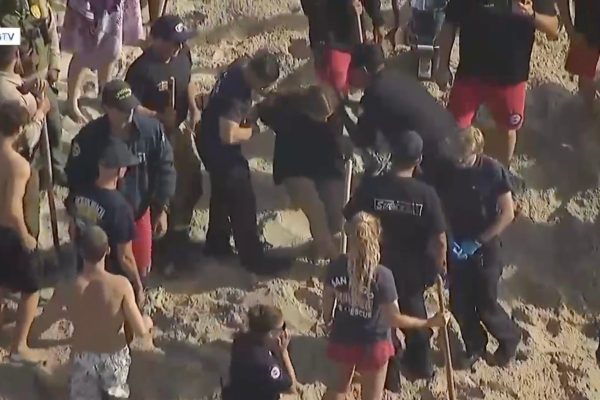 Rescue Operation Saves 16-Year-Old Trapped in Collapsed Sand Hole on Beach