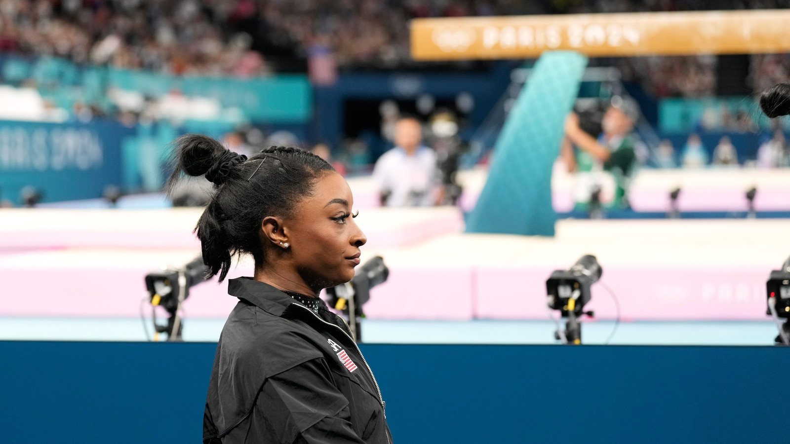 Simone Biles Overcomes Leg Injury to Excel in Olympic Gymnastics Qualifying