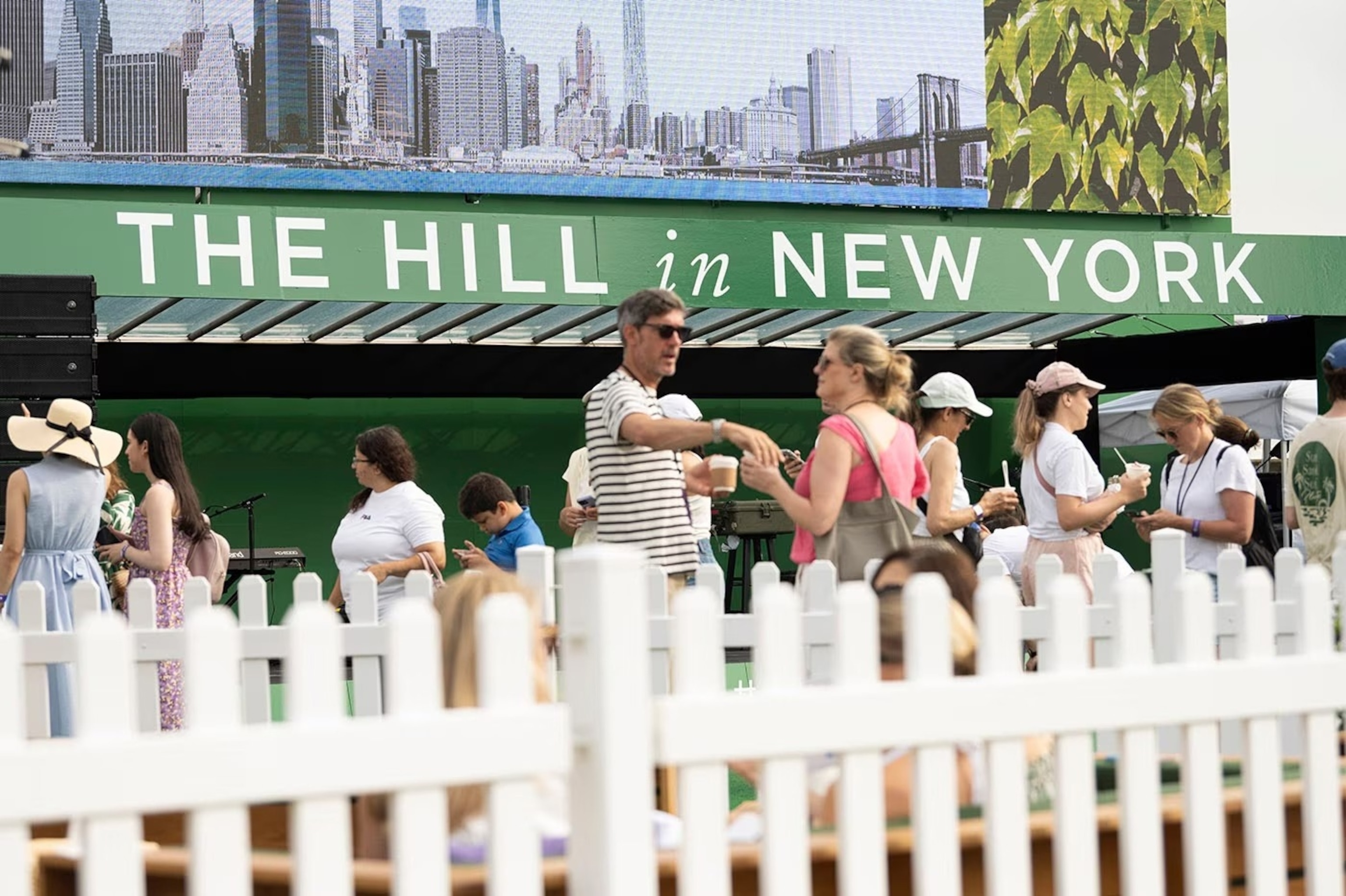 PHOTO:  Fans gather across the pond in Brooklyn Bridge Park to experience a taste of Wimbledon at The Hill in New York.