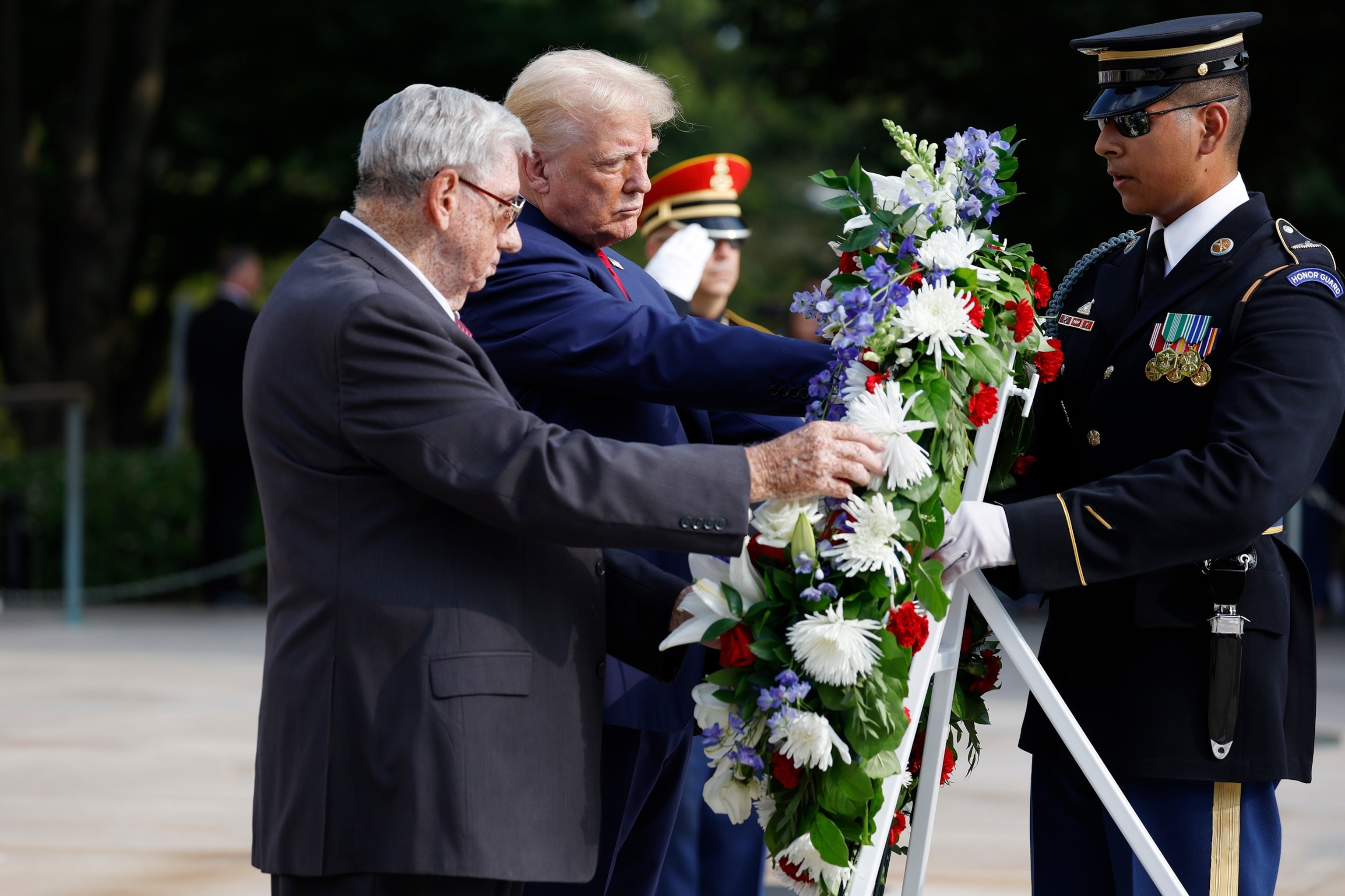 PHOTO: Republican presidential nominee, former President Donald Trump during a wreath laying ceremony at the Tomb of the Unknown Soldier at Arlington National Cemetery on Aug. 26, 2024 in Arlington, Va.