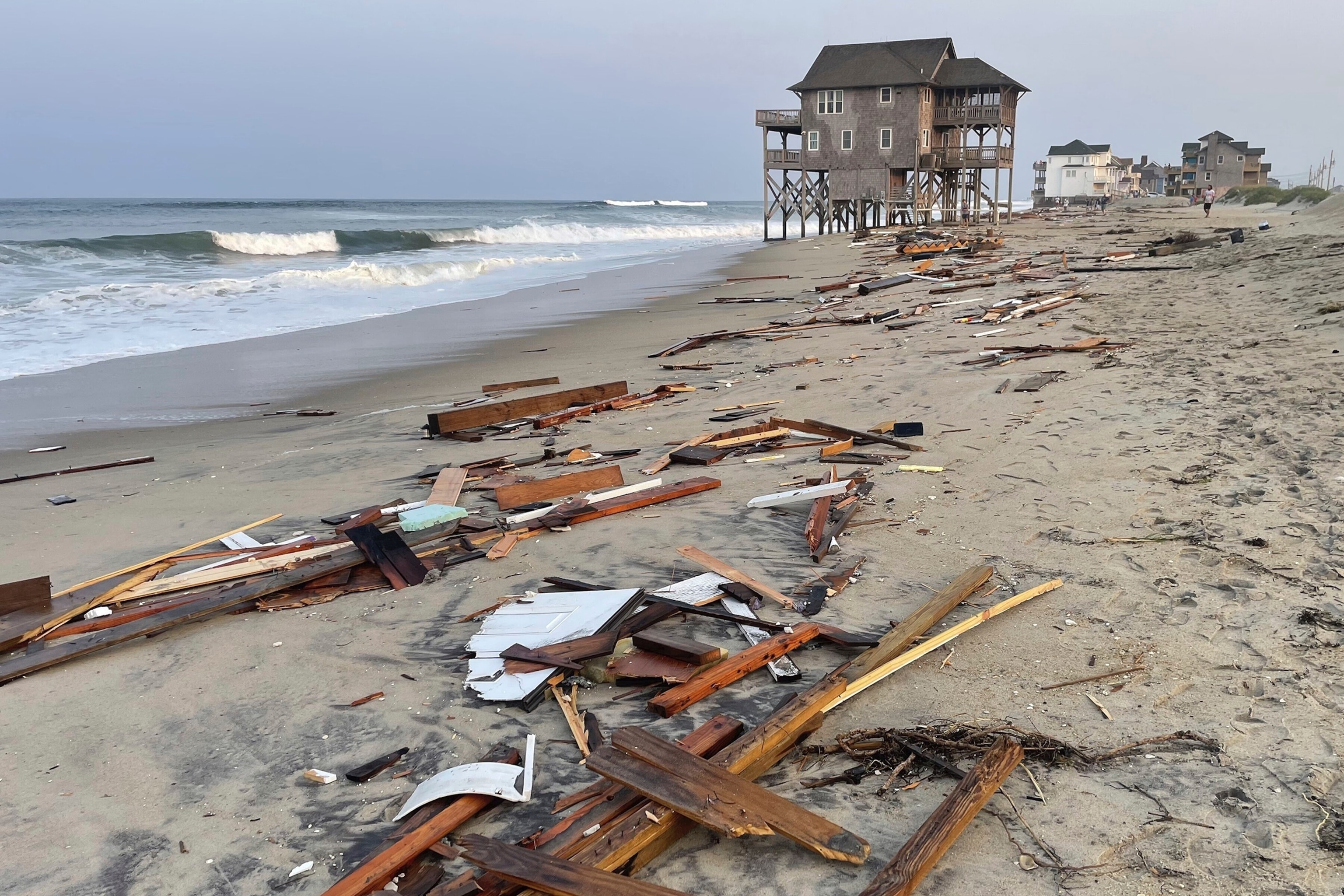 PHOTO: This photo provided by the National Park Service on Friday, Aug. 16, 2024, in Rodanthe, N.C., along the Cape Hatteras National Seashore shows debris from an unoccupied beach house that collapsed amid waves caused by Hurricane Ernesto.