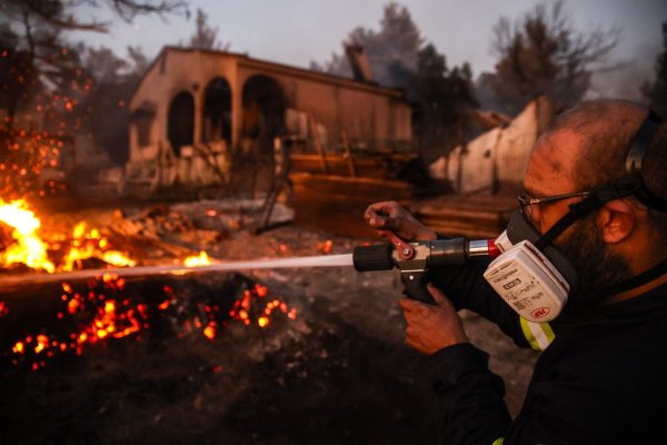 Firefighters make progress in containing violent wildfires near Athens, with only scattered hotspots remaining