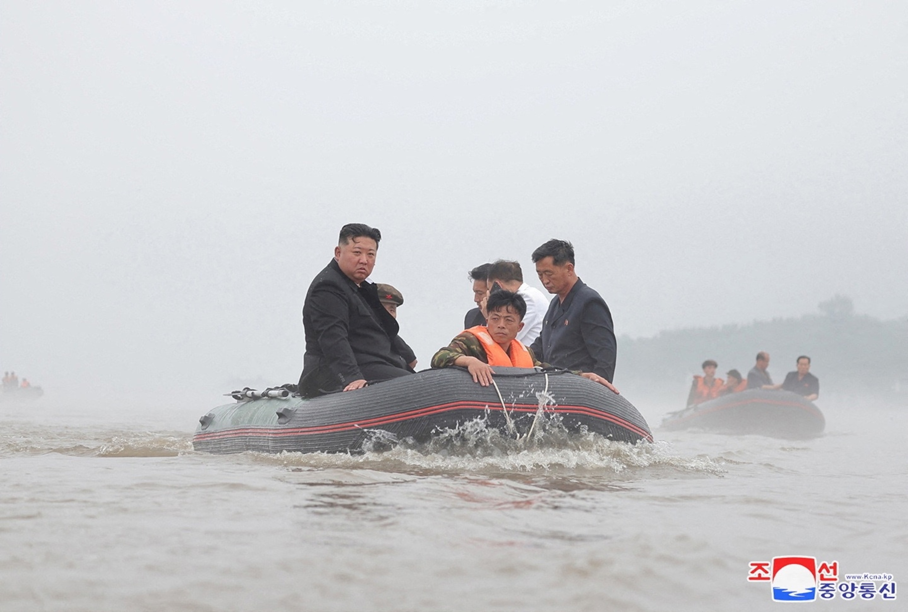 PHOTO: North Korean leader Kim Jong Un and Premier Kim Tok Hun visit a flood-affected area near the border with China, in North Pyongan Province in this undated photo released July 31, 2024 by North Korea's official Korean Central News Agency.