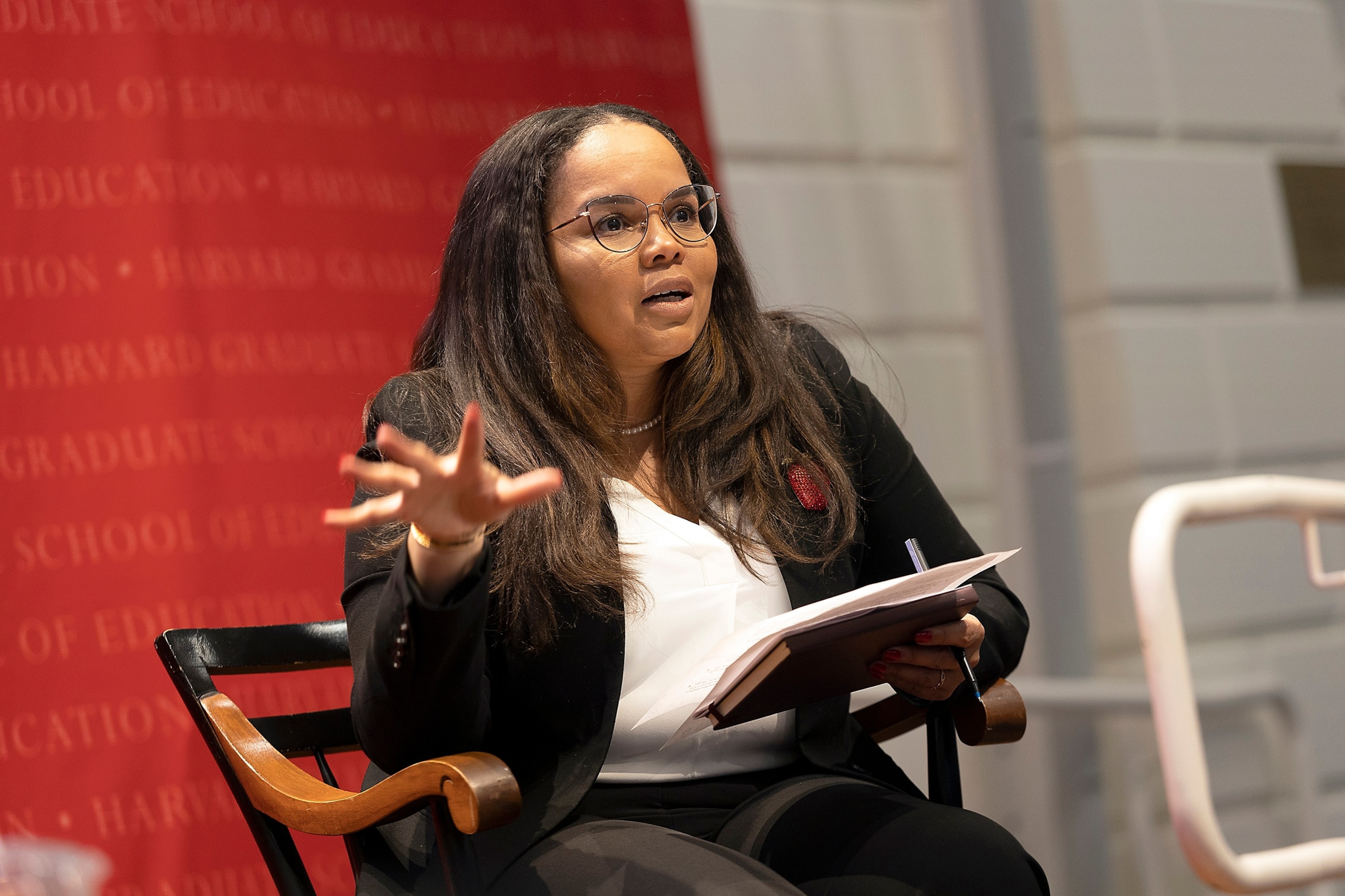 PHOTO: Dr. Christina Grant speaks at the  'AskWith Forum' at Harvard Graduate School of Education, on April 2, 2024.