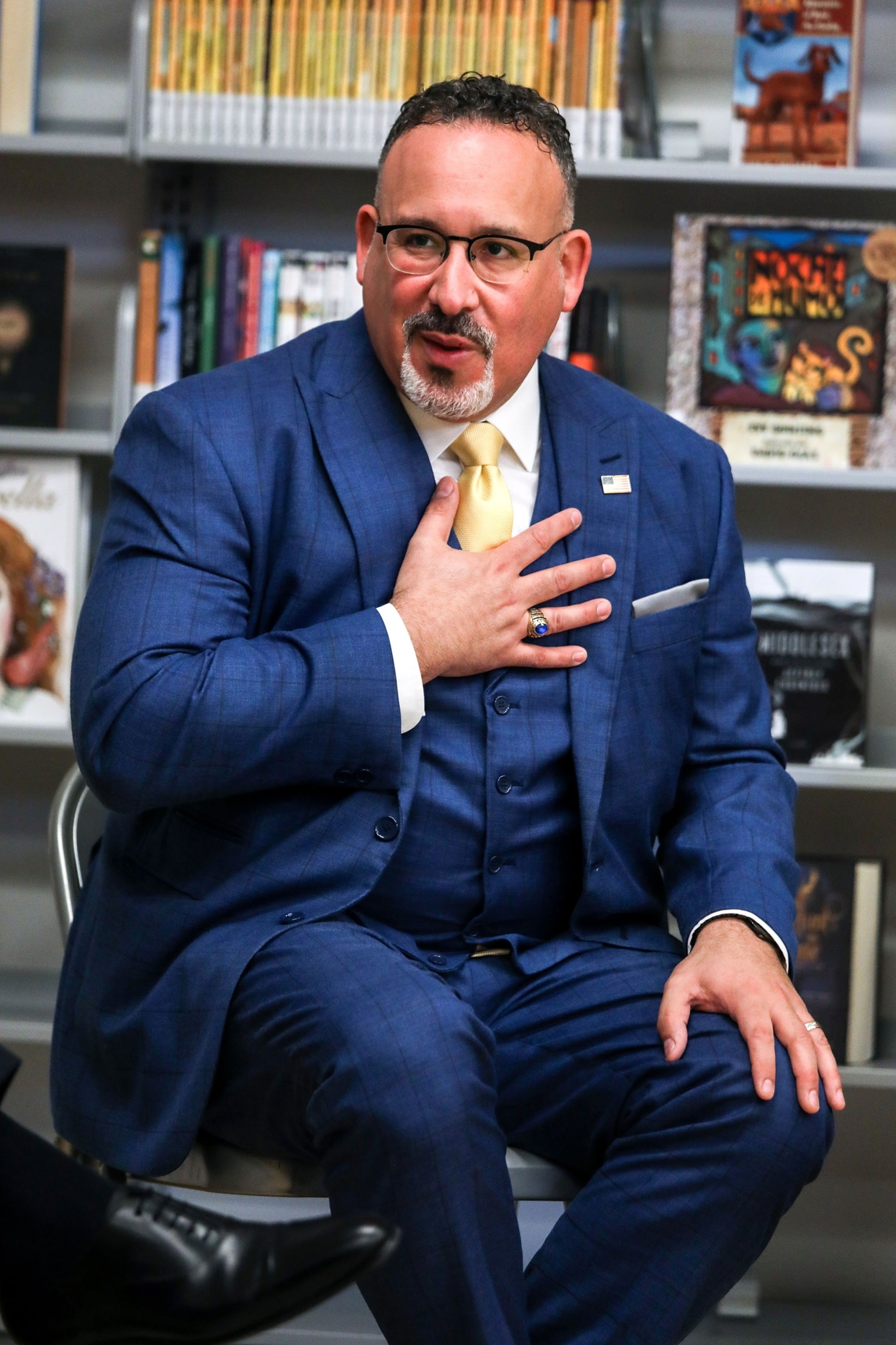 PHOTO: In this March 30, 2022, file photo, the U.S. Secretary of Education, Miguel Cardona speaks with parents and faculty at Los Angeles High School of the Arts at Robert F. Kennedy Community School  in Los Angeles.