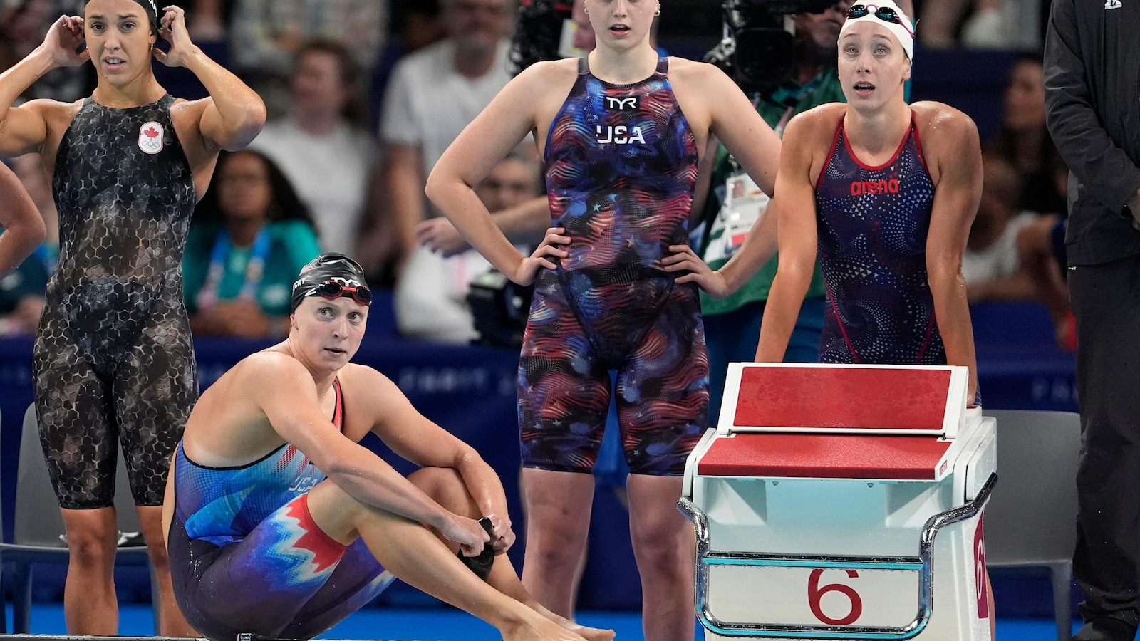 Ledecky earns 13th medal with silver, McIntosh and Douglass win gold.