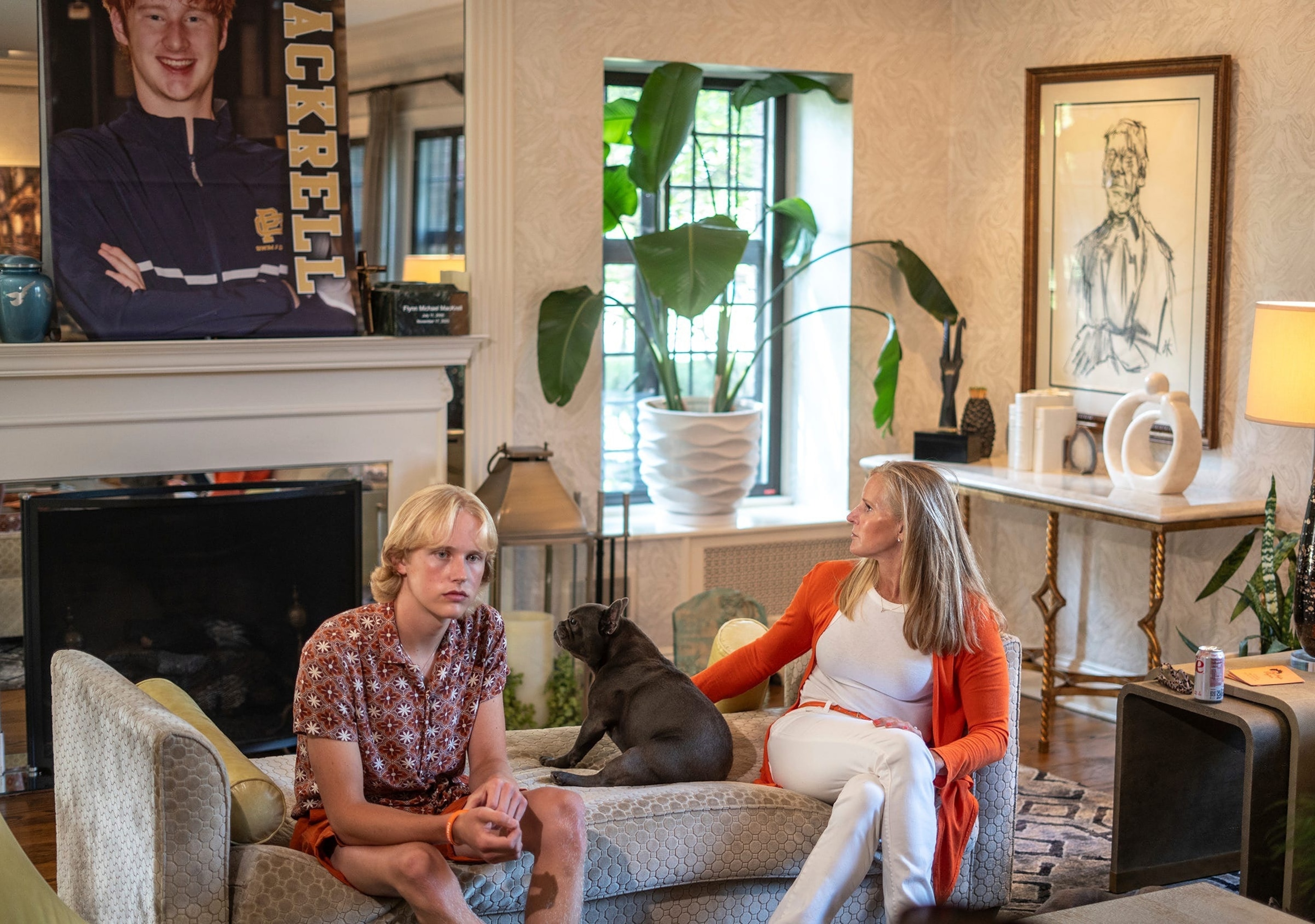 PHOTO: Anne Vanker, of Grosse Pointe, sits with her son Thaddeus MacKrell, left, as they talk about the loss their 18-year-old family member Flynn MacKrell, who was killed in a car crash.