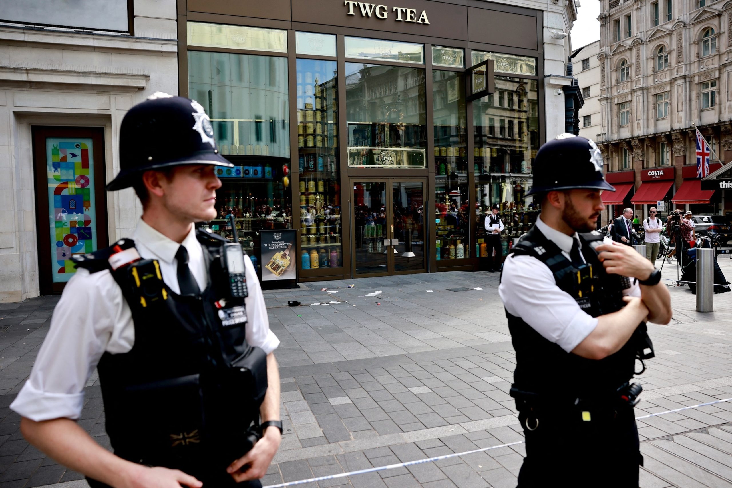 Police arrest man after stabbing of child and woman in London