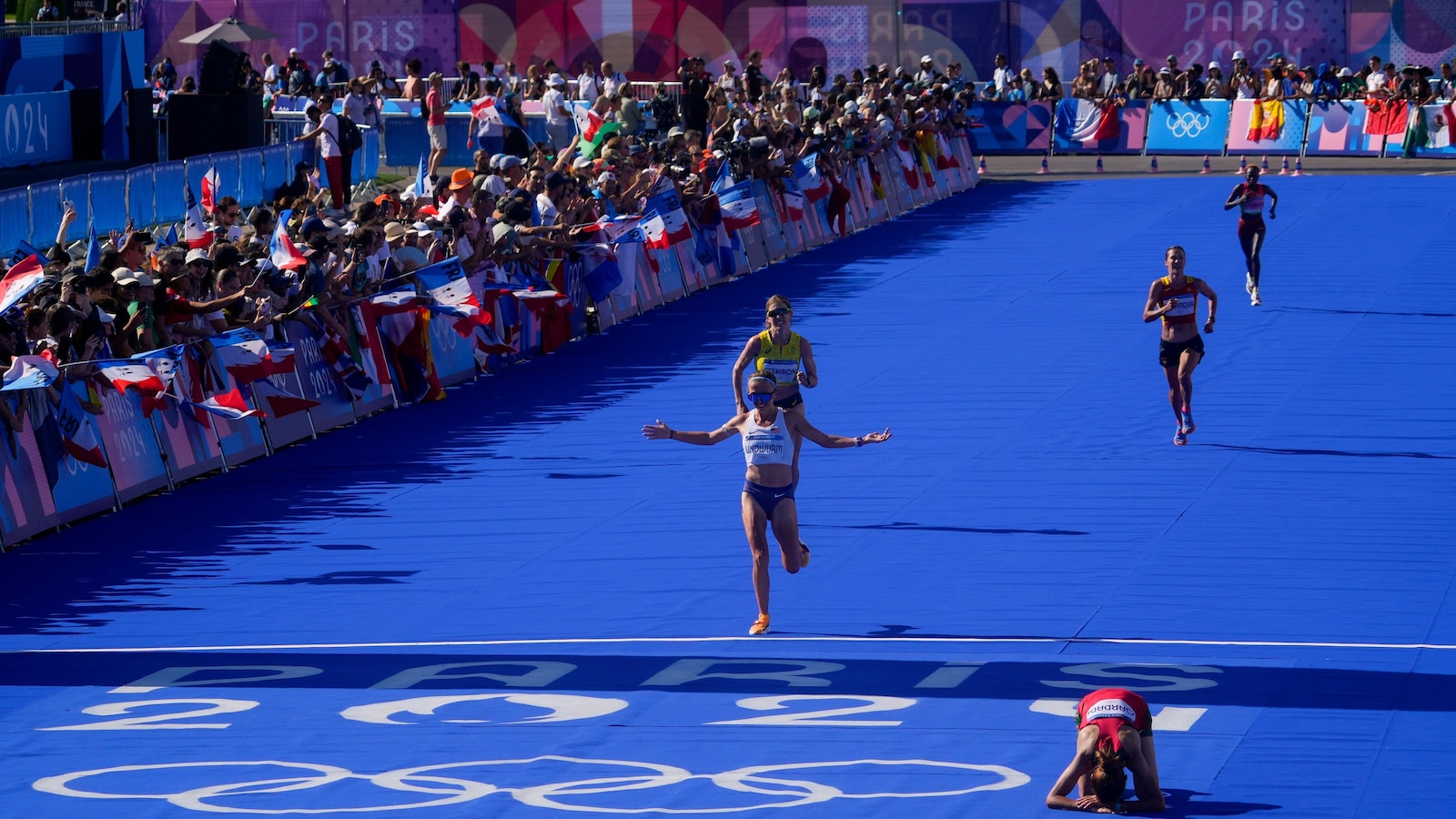 Sifan Hassan emerges victorious in the women's marathon at the Paris Olympics, narrowly beating Tigst Assefa