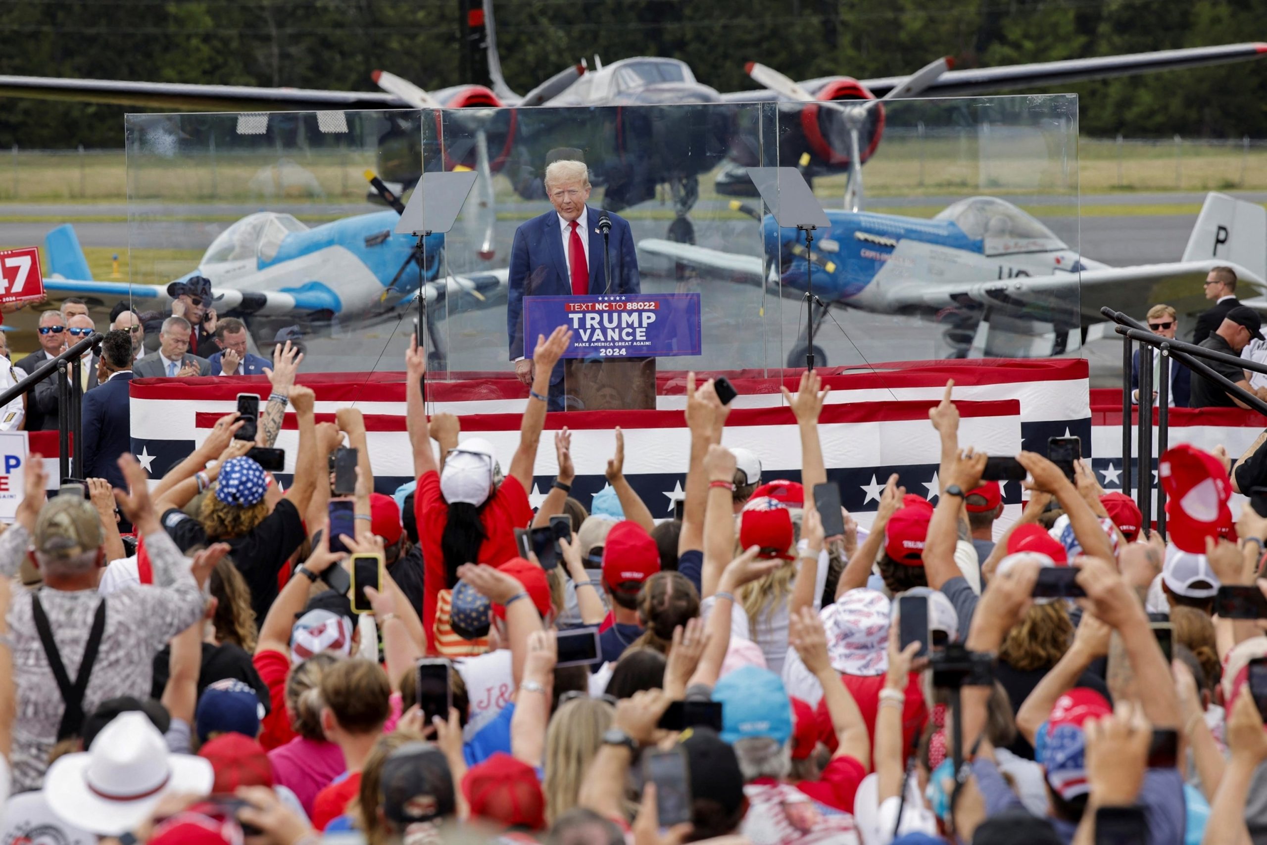 Trump delivers speech from behind bulletproof glass at his first outdoor rally since the Butler shooting