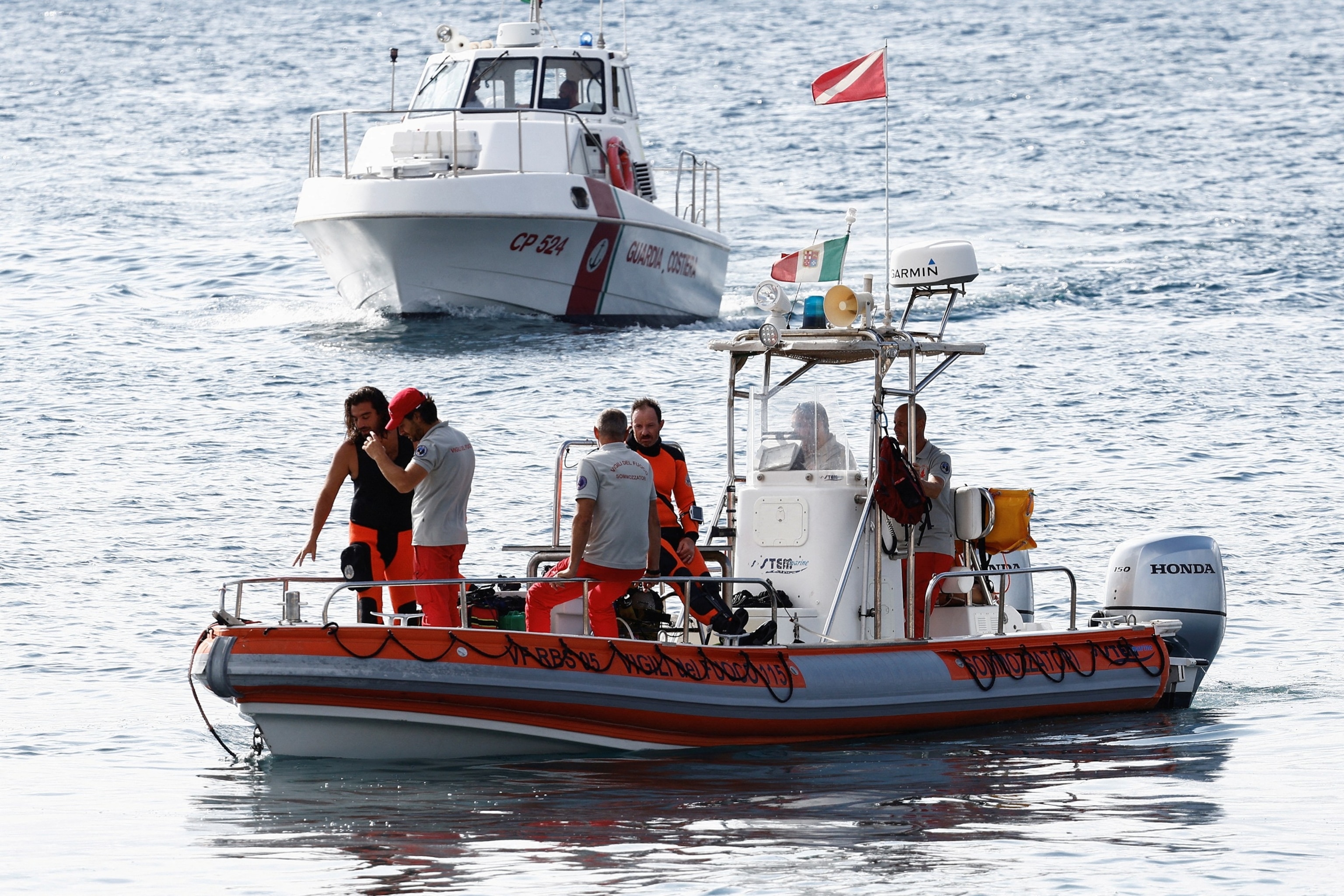 PHOTO: Rescue operations continue after a luxury yacht sank off Sicily