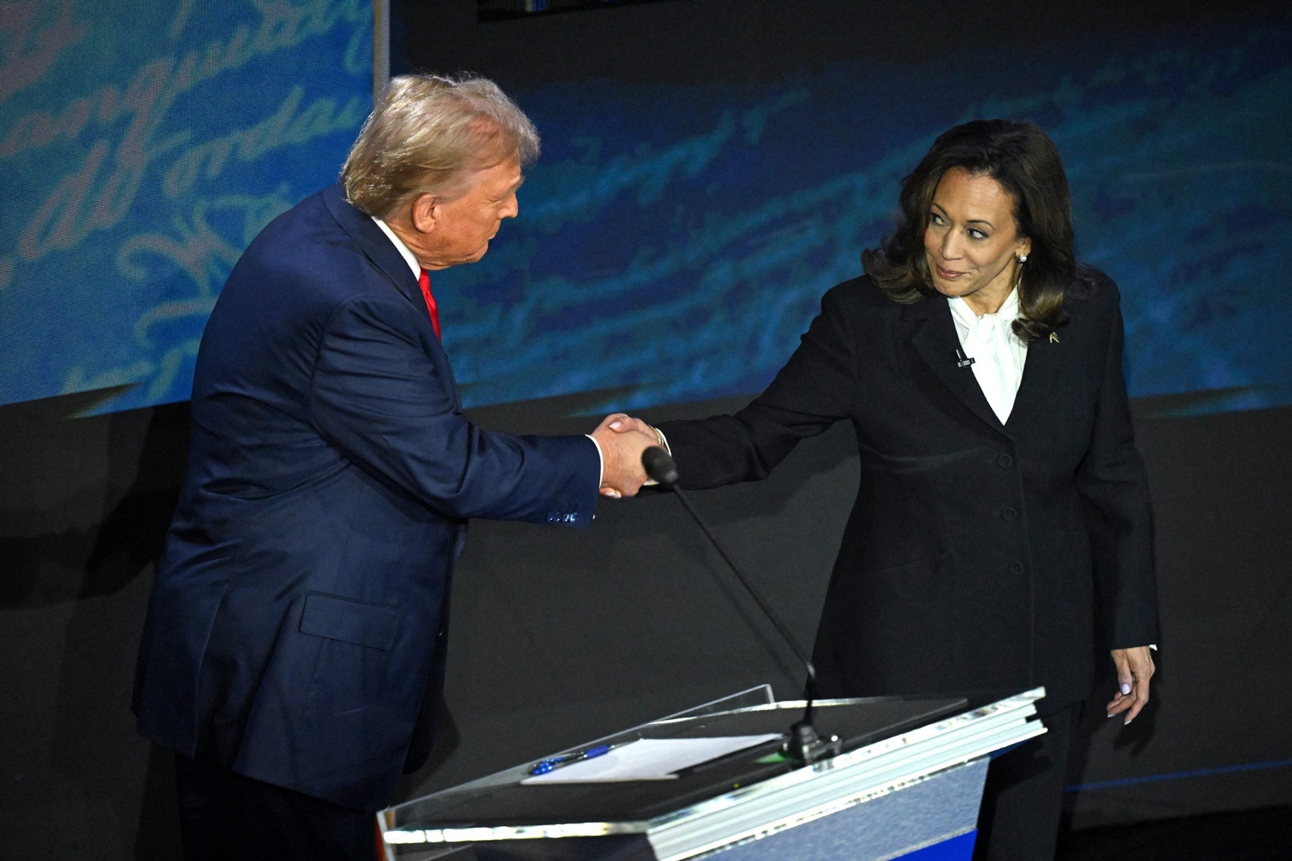 First Meeting Between Harris and Trump Includes Handshake