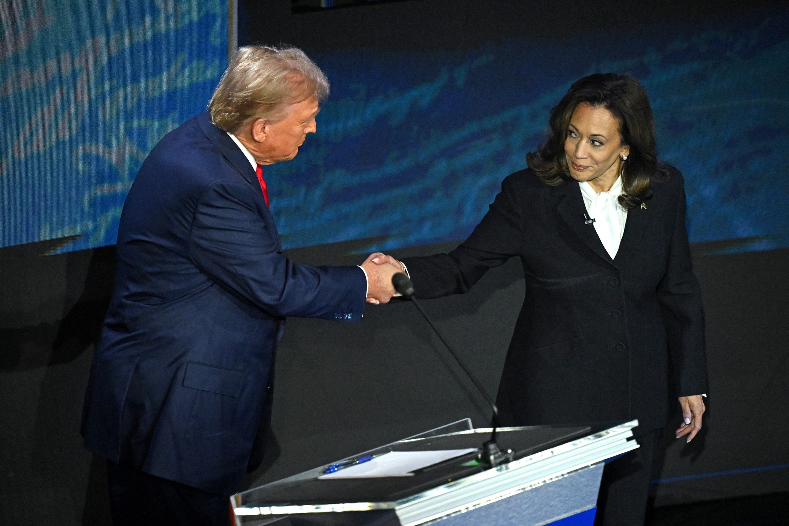 PHOTO: Vice President and Democratic presidential candidate Kamala Harris (R) shakes hands with former President and Republican presidential candidate Donald Trump during a presidential debate in Philadelphia, on Sept. 10, 2024.