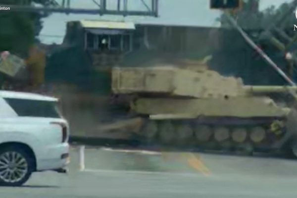 Train collides with military vehicle-carrying 18-wheeler in South Carolina on video